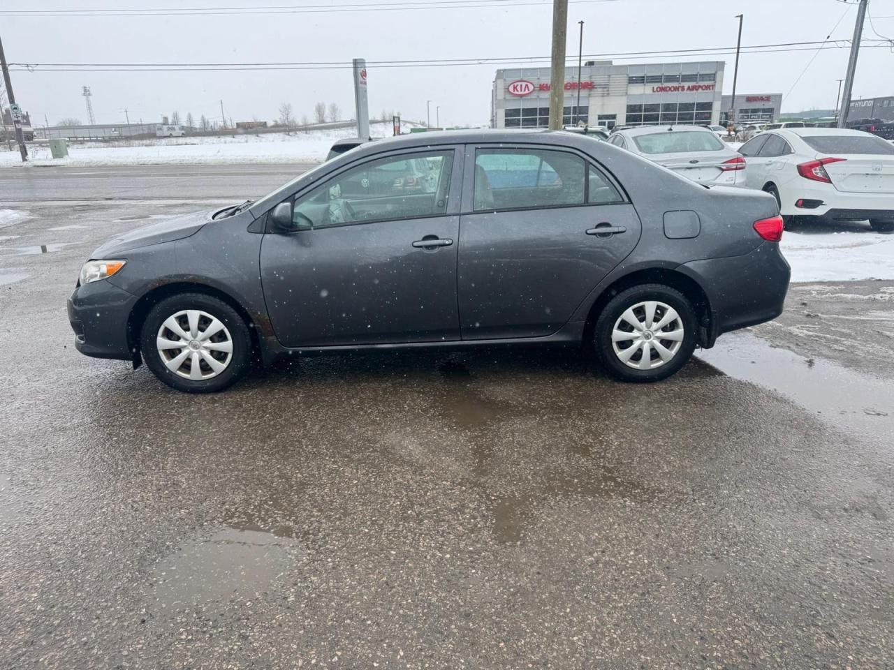 2010 Toyota Corolla CE, NO ACCIDENTS, DRIVES GOOD, MANUAL, AS IS - Photo #2