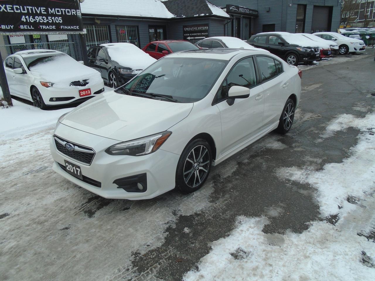 Used 2017 Subaru Impreza SPORT / 6SPD / REAR CAM / SUNROOF / AWD / CARPLAY for sale in Scarborough, ON