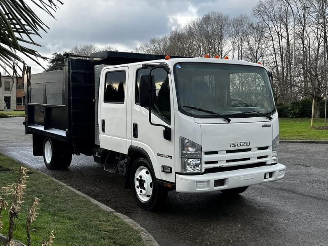 Used 2015 Isuzu NPR HD Crew Cab 10 Foot Dump Truck Diesel for sale in Burnaby, BC