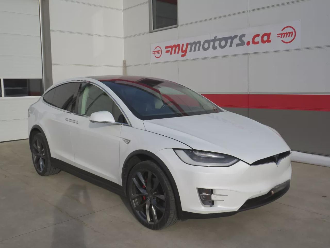 2016 Tesla Model X Model X P90D  | Rare | Signature Edition | AWD | Falcon Wing Rear Doors | Alloy Rims | Fog Lights | Leather | Navigation | Power Seats | Power Doors | 17 Inch Touchscreen Display | Custom Rear Mat | Heated Seats | Heated Steering Wheel | Reverse Camera Photo