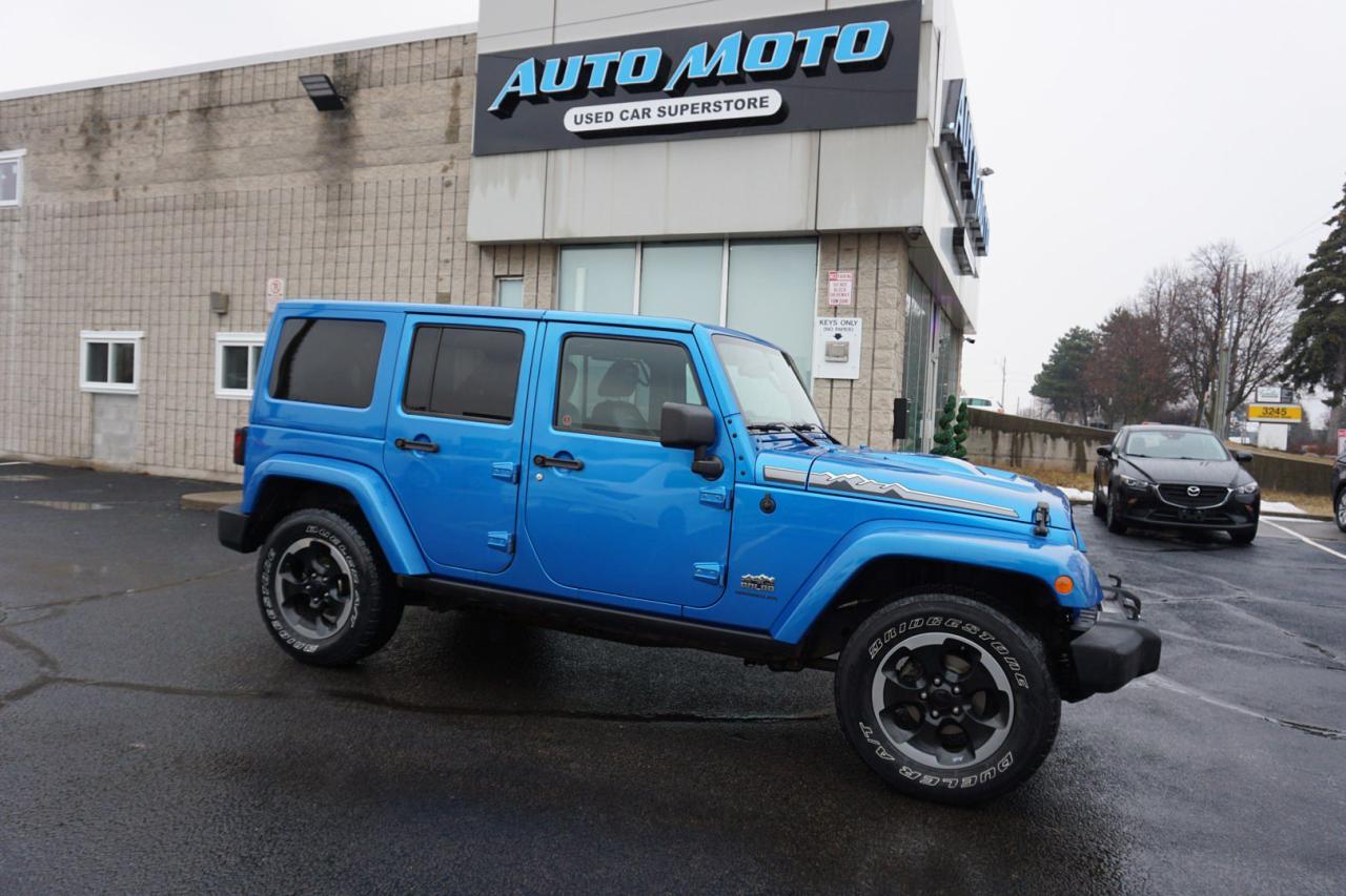 Used 2014 Jeep Wrangler 3.6L V6 POLAR EDITION UNLIMITED SAHARA 4WD *ACCIDENT FREE* CERTIFIED NAV BLUETOOTH LEATHER CRUISE ALLOYS for sale in Burlington, ON