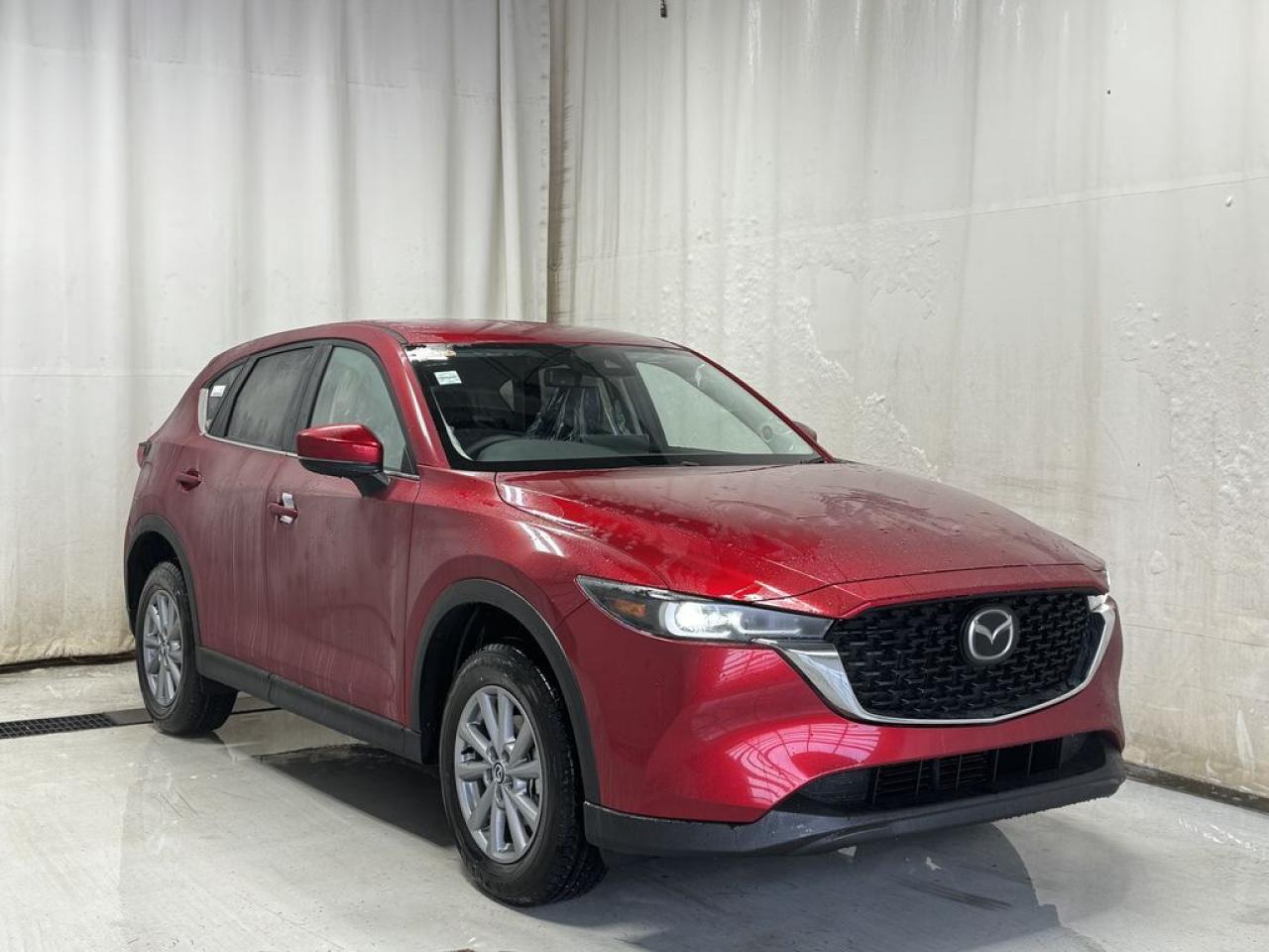 <p>NEW 2025 CX-5 GS AWD. Bluetooth, Skyactiv-G 2.5 L (Inline-4). Backup Cam, Available NAV, Leatherette/Suede Heated Seats, Type-C USB Input, Keyless Remote Entry, Power Trunk, Adaptive Cruise Control, Heated Steering Wheel, Wiper Blade De-Icer, Auto Dual-Zone Climate Control, Rear Air Vents, Auto Rain-Sensing Wipers, Electronic Parking Brake, Heated Mirrors, 17 Silver Metallic Alloy Wheels</p>  <p>Includes:</p> <p>i-ACTIVSENSE + Safety Features (Smart City Brake Support-Front, Rear Cross Traffic Alert, Mazda Radar Cruise Control With Stop & Go, Distance Recognition Support System, Lane-Keep Assist System, Lane Departure Warning System, Advanced Blind Spot Monitoring)</p>  <p>A joy to drive, our 2025 Mazda CX-5 GS AWD radiates refined style in Soul Red Crystal Metallic! Motivated by a 2.5 Liter 4 Cylinder that delivers 187hp tethered to a paddle-shifted 6 Speed Automatic transmission. You can put that strength to good use with the added traction of torque vectoring, and this All Wheel Drive SUV returns nearly approximately 7.8L/100km on the highway. Our CX-5 also has an expressive design with bold details like 17-inch alloy wheels, a rear roof spoiler, and bright-tipped dual exhaust outlets.</p>  <p>Our GS cabin is no ordinary interior. Its tailor-made for better travel with heated leatherette/suede power front seats, a leather-wrapped steering wheel, automatic climate control, pushbutton ignition, and keyless access. Mazda makes connecting easy by providing a 10.25-inch central display, a multifunction Commander controller, Apple CarPlay/Android Auto, Bluetooth, voice control, and six-speaker audio. The versatile rear cargo space adds adventure-friendly functionality.</p>  <p>Safety is a high priority for Mazda, which helps protect you and your loved ones with automatic emergency braking, adaptive cruise control, a rearview camera, lane-keeping assistance, blind-spot monitoring, and other intelligent technologies. With all that, our CX-5 GS is here to transcend the ordinary! Save this page, Come in for a Qualified Test Drive. We Know You Will Enjoy Your Test Drive Towards Ownership!</p>  <p>Call 587-409-5859 for more info or to schedule an appointment! Listed Pricing is valid for 72 hours. Financing is available, please see dealer for term availability and interest rates. AMVIC Licensed Business.</p>