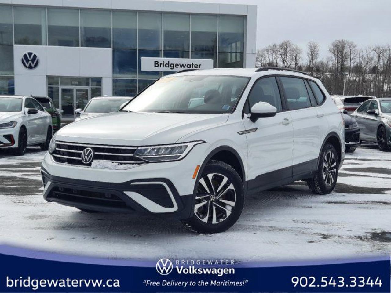 New Price! White 2024 Volkswagen Tiguan Trendline 4Motion | Apple CarPlay | Android Auto AWD 8-Speed Automatic 2.0L TSI Bridgewater Volkswagen, Located in Bridgewater Nova Scotia.AWD, 3.533 Axle Ratio, 4-Wheel Disc Brakes, 6 Speakers, ABS brakes, Air Conditioning, Alloy wheels, Brake assist, Bumpers: body-colour, Cloth Seating Surfaces, Compass, Delay-off headlights, Driver door bin, Driver vanity mirror, Dual front impact airbags, Dual front side impact airbags, Electronic Stability Control, Exterior Parking Camera Rear, Four wheel independent suspension, Front anti-roll bar, Front Bucket Seats, Front reading lights, Fully automatic headlights, Heated door mirrors, Heated Front Bucket Seats, Heated front seats, Heated steering wheel, Illuminated entry, Leather Shift Knob, Low tire pressure warning, Occupant sensing airbag, Outside temperature display, Overhead airbag, Overhead console, Panic alarm, Passenger door bin, Passenger vanity mirror, Power door mirrors, Power steering, Power windows, Radio data system, Radio: 6.5 Touchscreen Infotainment System, Rear anti-roll bar, Rear reading lights, Rear window defroster, Rear window wiper, Remote keyless entry, Speed control, Speed-sensing steering, Split folding rear seat, Spoiler, Standard Suspension, Steering wheel mounted audio controls, Tachometer, Telescoping steering wheel, Tilt steering wheel, Traction control, Trip computer, Turn signal indicator mirrors, Variably intermittent wipers, Wheels: 7J x 17 Dublin Alloy.Volkswagen Certified Details:* A 6-month subscription to Volkswagen 24-hour roadside assistance* A completed 112-point inspection plus mechanical and appearance reconditioning assessment performed by a Volkswagen factory-trained technician* Any remaining new-vehicle limited warranty. Certified Pre-Owned vehicles are eligible for extended warranty coverage, giving you greater peace of mind* Prepaid Maintenance is now available for Certified Pre-Owned Volkswagens. Lock in your maintenance fees by choosing between a 2- or 3-year plan. Vehicles up to 7 years of age are eligible for the purchase of our Prepaid Maintenance plans regardless of mileage. A 3-month SiriusXM all-access trial subscription / Recent college, CEGEP or university Graduates can get a $500 rebate / CARFAX Vehicle History Report. A 3-month SiriusXM all-access trial subscription* Finance rates from 4.99%