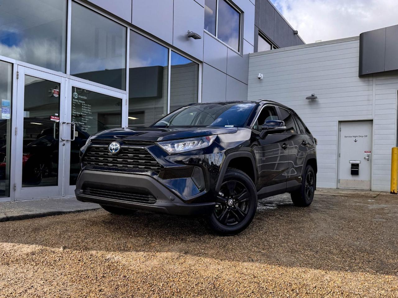 Our inviting 2024 Toyota Rav4 Hybrid LE is shown off in Midnight Black Metallic! Its powered by a 2.5 Liter gas/electric engine that produces 219 horsepower while paired to a CVT. Its absolutely stunning with alloy wheels, LED headlights, and rear roof spoiler.Inside our LE, open the door to find a world of comfort and convenience with cloth seating, front heated seats, a steering wheel with mounted audio/cruise controls (adaptive), a power sunroof, an AM/FM radio thats XM radio ready, an impressive 6 speaker sound system.Our Toyota will give you peace of mind with its wide variety of safety features including a backup camera, a lane departure system, dusk-sensing headlights, stability/traction control, an immense amount of airbags and more!Print this page and call us Now... We Know You Will Enjoy Your Test Drive Towards Ownership! We look forward to showing you why Go Mazda is the best place for all your automotive needs.Go Mazda is an AMVIC licensed business.Clean CarFax