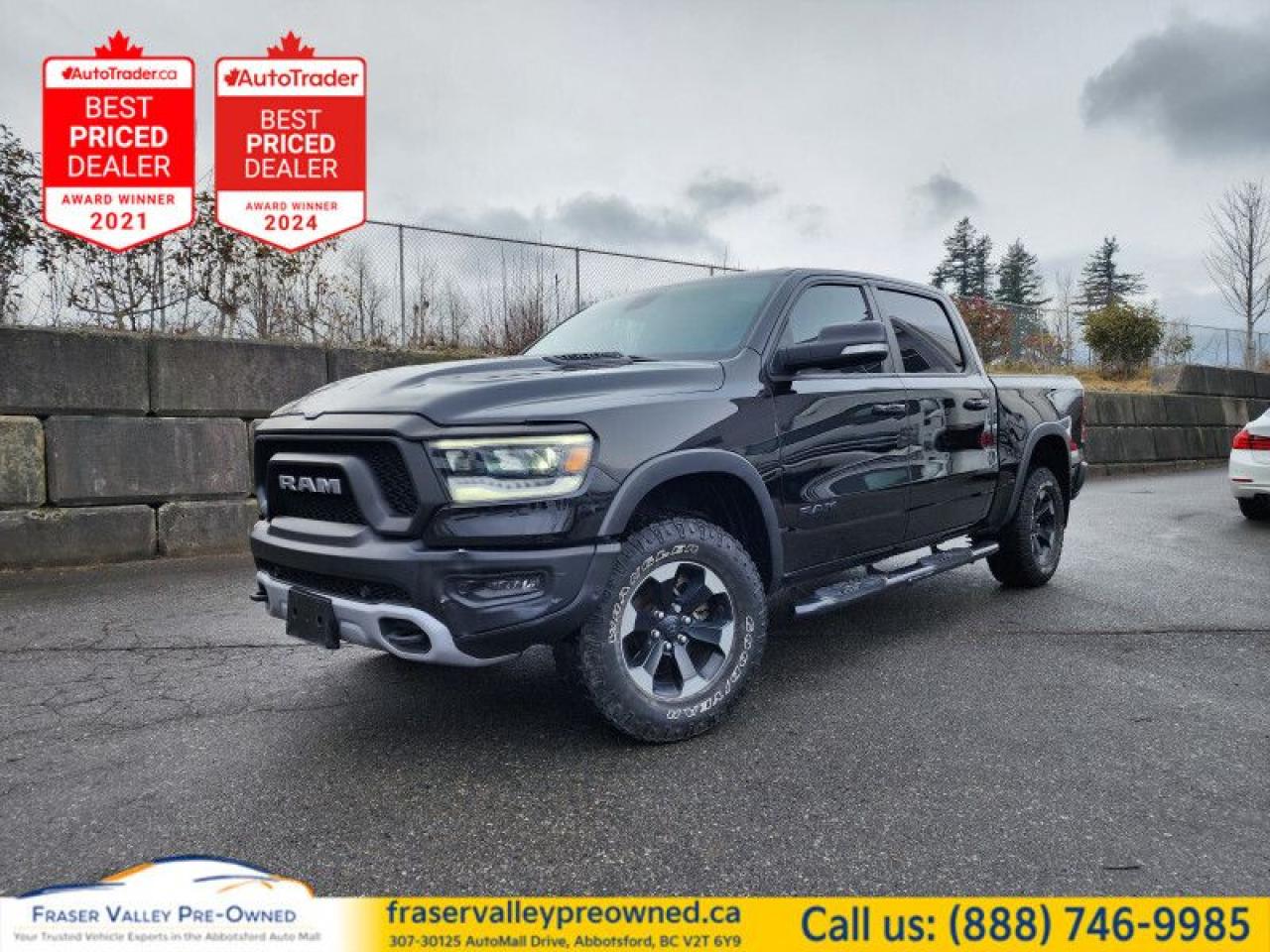 Off-Road Suspension,  Aluminum Wheels,  Sport Performance Hood,  Black Accents,  Proximity Key!
 
    Fully redesigned for 2019, this Ram 1500 has reduced weight and increased payload and towing capacity over the previous generations. This  2019 Ram 1500 is fresh on our lot in Abbotsford. 
 
The Ram 1500 delivers power and performance everywhere you need it, with a tech-forward cabin that is all about comfort and convenience. Loaded with best-in-class features, its easy to see why the Ram 1500 is so popular. With the most towing and hauling capability in a Ram 1500, as well as improved efficiency and exceptional capability, this truck has the grit to take on any task. This  crew cab 4X4 pickup  has 124,615 kms. Its  black in colour  . It has a 8 speed automatic transmission and is powered by a  395HP 5.7L 8 Cylinder Engine.  
 
 Our 1500s trim level is Rebel. This menacing Ram 1500 Rebel comes very well equipped with unique aluminum wheels, a sport performance hood, Bilstein off-road suspension with skid plates, Uconnect with a color touchscreen, wireless streaming audio, USB input jacks, and a handy rear view camera. This sweet pickup truck also comes with a power driver seat, a dampened tailgate, electronic shift-on-the-fly transfer case, hill decent control, power heated side mirrors, proximity keyless entry, cruise control, towing equipment, black bumpers with rear step, LED headlights and fog lights and much more. This vehicle has been upgraded with the following features: Off-road Suspension,  Aluminum Wheels,  Sport Performance Hood,  Black Accents,  Proximity Key,  Touchscreen,  Streaming Audio. 
 To view the original window sticker for this vehicle view this http://www.chrysler.com/hostd/windowsticker/getWindowStickerPdf.do?vin=1C6SRFLT9KN591112. 

 
To apply right now for financing use this link : https://www.fraservalleypreowned.ca/abbotsford-car-loan-application-british-columbia
 
 

| Our Quality Guarantee: We maintain the highest standard of quality that is required for a Pre-Owned Dealership to operate in an Auto Mall. We provide an independent 360-degree inspection report through licensed 3rd Party mechanic shops. Thus, our customers can rest assured each vehicle will be a reliable, and responsible purchase.  |  Purchase Disclaimer: Your selected vehicle may have a differing finance and cash prices. When viewing our vehicles on third party  marketplaces, please click over to our website to verify the correct price for the vehicle. The Sale Price on third party websites will always reflect the Finance Price of our vehicles. If you are making a Cash Purchase, please refer to our website for the Cash Price of the vehicle.  | All prices are subject to and do not include, a $995 Finance Fee, and a $995 Document Fee.   These fees as well as taxes, are included in all listed listed payment quotes. Please speak with Dealer for full details and exact numbers.  o~o