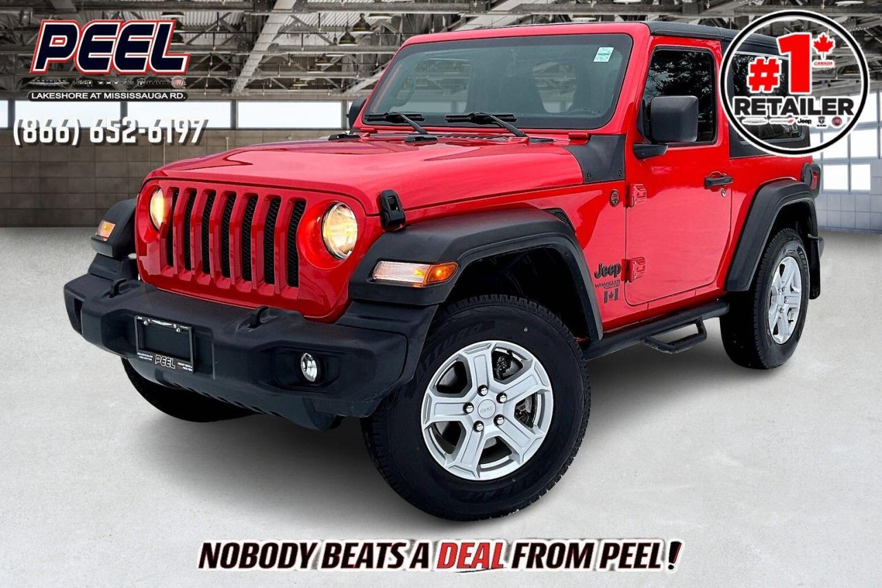 COME SEE WHY NOBODY BEATS A DEAL FROM PEEL! Your Source for ALL make and models used cars and trucks. Canadas #1 Stellantis Retailer for 9 years & counting!!

2019 Jeep Wrangler Sport S 2 Door 4X4 | 3.6L V6 | 6-speed Manual Transmission | Firecracker Red | Cloth Bucket Seats | Uconnect 7" Touchscreen Display | Technology Group | Apple CarPlay & Android Auto | Dual-zone Automatic Climate Control | Black Freedom 3-piece Hard Top | Trac-Lok Anti-spin Differential Rear Axle

Clean Carfax

Ready to take on trails or city streets, this 2019 Jeep Wrangler Sport S 2-Door 4X4 in bold Firecracker Red offers classic Jeep capability with modern tech and a fun, hands-on driving experience. Powered by the iconic 3.6L V6 and paired with a 6-speed manual transmission, this Wrangler delivers engaging performance and ultimate control for off-road adventures. Inside, Cloth Bucket Seats and Dual-Zone Automatic Climate Control keep you comfortable, while the Uconnect 7 Touchscreen with Apple CarPlay & Android Auto ensures seamless connectivity on the go. The Black Freedom 3-Piece Hardtop provides the versatility of open-air freedom or all-weather protection. Equipped with the Trac-Lok Anti-Spin Differential Rear Axle, its ready to tackle uneven terrain with confidence. With a Clean Carfax, this Wrangler Sport S combines classic ruggedness, hands-on driving fun, and modern convenienceperfect for anyone looking to make every drive an adventure!
______________________________________________________

Engage & Explore with Peel Chrysler: Whether youre inquiring about our latest offers or seeking guidance, 1-866-652-6197 connects you directly. Dive deeper online or connect with our team to navigate your automotive journey seamlessly.

WE TAKE ALL TRADES & CREDIT. WE SHIP ANYWHERE IN CANADA! OUR TEAM IS READY TO SERVE YOU 7 DAYS!
______________________________________________________
Our advertised prices are for consumers (i.e end users) only. 

*FREE CarFax (click the link above to check it out at no cost to you!)*

*FULLY CERTIFIED! (Have you seen some of these other dealers stating in their advertisements that certification is an additional fee? NOT HERE! Our certification is already included in our low sale prices to save you more!)

______________________________________________________

Peel Chrysler  A Trusted Destination: Based in Port Credit, Ontario, we proudly serve customers from all corners of Ontario and Canada including Toronto, Oakville, North York, Richmond Hill, Ajax, Hamilton, Niagara Falls, Brampton, Thornhill, Scarborough, Vaughan, London, Windsor, Cambridge, Kitchener, Waterloo, Brantford, Sarnia, Pickering, Huntsville, Milton, Woodbridge, Maple, Aurora, Newmarket, Orangeville, Georgetown, Stouffville, Markham, North Bay, Sudbury, Barrie, Sault Ste. Marie, Parry Sound, Bracebridge, Gravenhurst, Oshawa, Ajax, Kingston, Innisfil and surrounding areas. On our website www.peelchrysler.com, you will find a vast selection of new vehicles including the new and used Ram 1500, 2500 and 3500. Chrysler Grand Caravan, Chrysler Pacifica, Jeep Cherokee, Wrangler and more. All vehicles are priced to sell. We deliver throughout Canada. website or call us 1-866-652-6197. 

Disclaimer Statement: At Peel Chrysler, your satisfaction is our priority. While many pre-owned vehicles originally come with two keys, variations may occur based on trade-ins, and all Peel Chrysler Pre-Owned Vehicles come standard with one key—any extras provided by the previous owner will be included with your purchase, and additional keys can be bought at the time of sale. Online prices and payments are for finance purchases. Used vehicles that are being financed are subject to a $499 (^$1500 non-prime) financing fee, while cash purchases (certified cheque, bank draft, or wire transfer) on used vehicles have a $2,000 surcharge ( online price + $2,000). Cash purchases of new vehicles only incur applicable taxes and licensing fees, and those priced above $100,000 (including accessories or add-ons) are subject to a federal luxury tax. Optional finance and lease terms are available, and if trading in a vehicle with an outstanding loan balance requiring Peel Chrysler to facilitate the lien payout, a Lien Payout Fee of $349 applies. Prices, rates, and payments are subject to change without notice. While we strive for accuracy, occasional technical or human errors may occur, so we encourage verifying all vehicle details, including features, options, materials, and specifications, with a Peel Chrysler representative by contacting us or visiting our dealership. Experience seamless convenience with our nationwide delivery options—visit our website or contact us for more details.