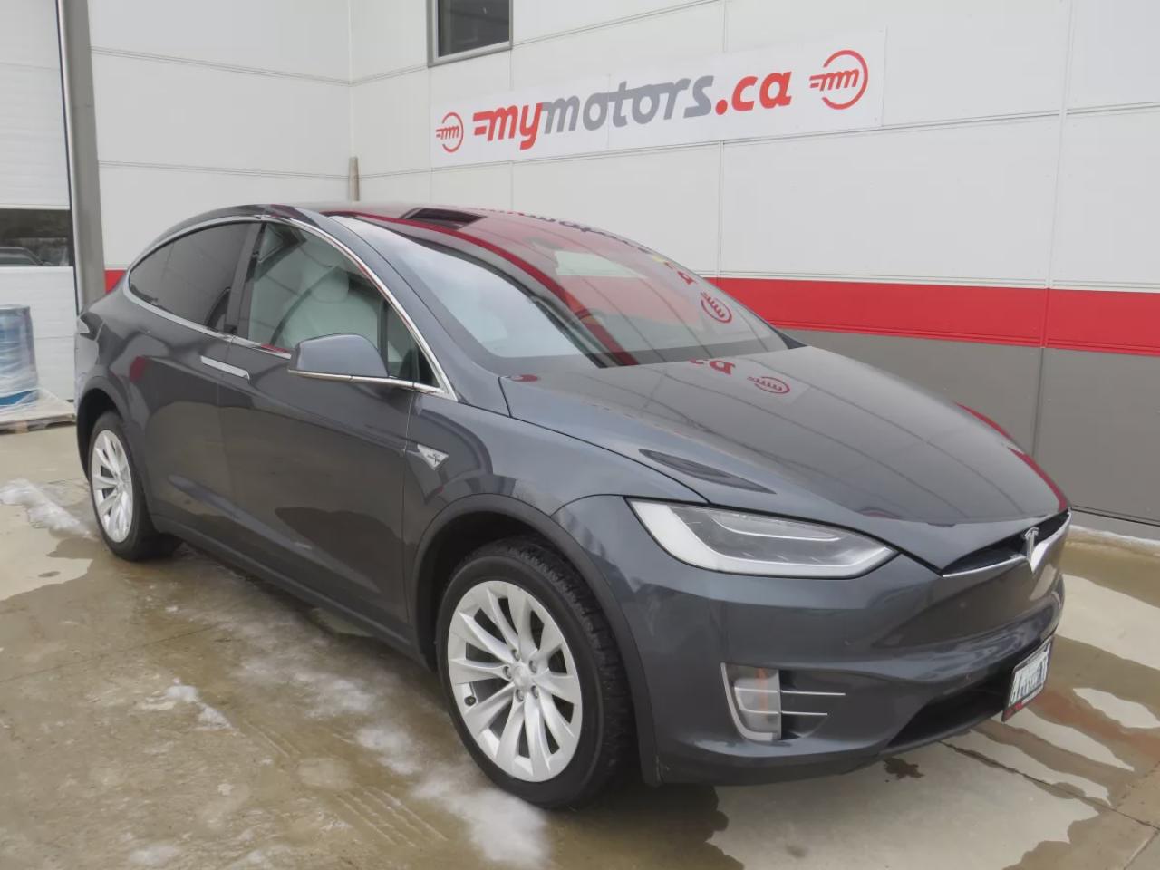 2016 Tesla Model X 90D (**AWD**FALCON WING REAR DOORS**ALLOY RIMS**FOG LIGHTS**LEATHER**NAVIGATION**POWER SEATS**POWER DOORS**17 INCH TOUCHSCREEN DISPLAY**HEATED SEATS**HEATED STEERING WHEEL**REVERSE CAMERA**BLUETOOTH**CRUISE CONTROL**) Photo