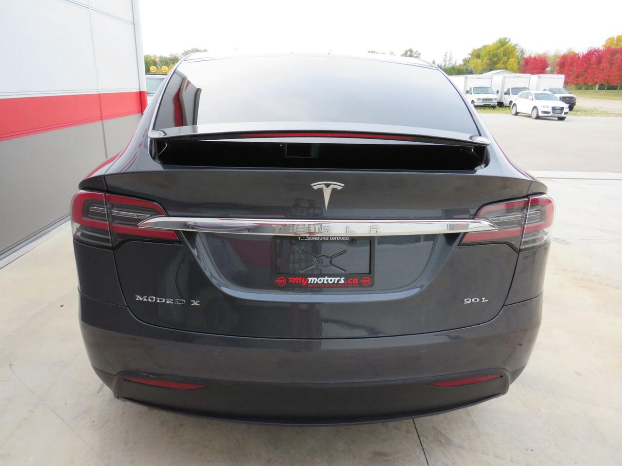 2016 Tesla Model X 90D  | AWD | Falcon Wing Rear Doors | Alloy Rims | Fog Lights | Leather | Navigation | Power Seats | Power Doors | 17 Inch Touchscreen Display | Heated Seats | Heated Steering Wheel | Reverse Camera | Bluetooth | Cruise Control Photo
