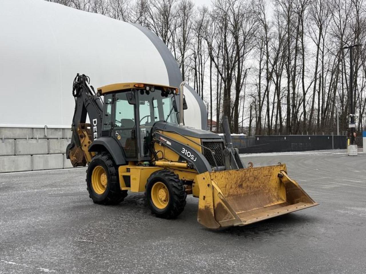 2011 John Deere 310SJ 4x4 Wheel Loader Extended Hoe 4 in 1 92 inch Bucket, Backhoe:Load Height-Std 11 feet 25 inches,
Reach From Swivel-Std 18 feet 25 inches,Dig Depth - Std 14 Feet 5inches,Load Height-Ext 14 feet 08 inches, Loader:Clearance At Max Dump Height 8Feet 83 inches,Reach At Max Dump Height 2 Feet 58 inches,Dig Depth 6 Feet 3 inches,
Lift Capacity At Full Height 7425.17lb,Bucket Capacity 1.01yd3.  $65,870.00 plus $375 processing fee, $66,245.00 total payment obligation before taxes.  Listing report, warranty, contract commitment cancellation fee, financing available on approved credit (some limitations and exceptions may apply). All above specifications and information is considered to be accurate but is not guaranteed and no opinion or advice is given as to whether this item should be purchased. We do not allow test drives due to theft, fraud, acts of vandalism and undetectable impaired driving. Instead we provide the following benefits: Complimentary Warranty (with options to extend), Limited Money Back Satisfaction Guarantee on Fully Completed Contracts, Contract Commitment Cancellation, and an Open-Ended Sell-Back Option. Ask seller for details or call 604-522-REPO(7376) to confirm listing availability.