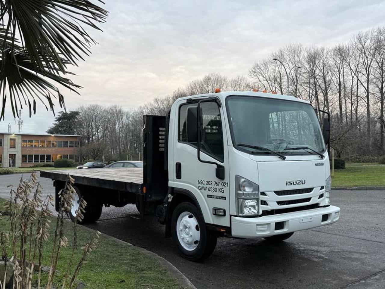 Used 2018 Isuzu NPR 16 foot Flat Deck for sale in Burnaby, BC