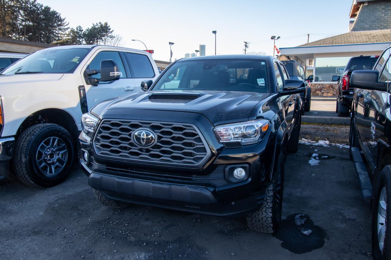 <p>Looking for a rugged and reliable pickup truck that can handle anything you throw at it? Look no further than this 2022 Toyota Tacoma DBL CAB SR5/TRD, now available at Key West Ford! This black beauty boasts a powerful engine and a durable build, making it perfect for work or play. With only 86291KM on the odometer, this Tacoma is practically brand new and ready for its next adventure.</p><p> </p><p>This Tacoma is packed with features that will make your driving experience even more enjoyable. Here are five of the most exciting features:</p><p><br /><br /></p><ol><ol><li><strong>TRD Off-Road Package:</strong> This package includes features like a locking rear differential, Bilstein shocks, and off-road tires, making this Tacoma ready to tackle any terrain.</li></ol></ol><p> </p><ol><ol><li><strong>SR5 Trim:</strong> The SR5 trim level offers a comfortable and stylish interior with features like heated seats, a premium sound system, and a touchscreen infotainment system.</li></ol></ol><p> </p><ol><ol><li><strong>Double Cab:</strong> The double cab configuration provides ample space for passengers and cargo, making it perfect for families or anyone who needs to haul gear.</li></ol></ol><p> </p><ol><ol><li><strong>Automatic Transmission:</strong> The smooth-shifting automatic transmission makes driving this Tacoma a breeze, whether youre cruising down the highway or navigating city streets.</li></ol></ol><p> </p><ol><ol><li><strong>Powerful Engine:</strong> The Tacomas powerful engine provides plenty of torque and horsepower, making it capable of towing and hauling with ease.</li></ol></ol><p><br /><br /></p><p>Dont miss out on this incredible opportunity to own a 2022 Toyota Tacoma DBL CAB SR5/TRD. Visit Key West Ford today to learn more and take it for a test drive!</p><p> </p><p>Experience peace of mind with our Buy With Confidence program! This vehicle comes with a 30-day/2,000 km exchange, a complimentary 6-month powertrain warranty (if the factory powertrain warranty has expired, personal-use vehicles only), comprehensive mechanical and safety inspection, Carfax report, and full disclosure. We are committed to transparent pricing. The advertised price excludes fees: $699 Documentation, $349 Registration/Insurance Transfer, $695 Finance Administration Fee (if applicable), and taxes. As BCs #1 Volume Dealer and #1 for Customer Experience on DealerRater, we prioritize your satisfaction. See Key West Ford for complete details. Book your test drive today!  Dealer #7485</p>