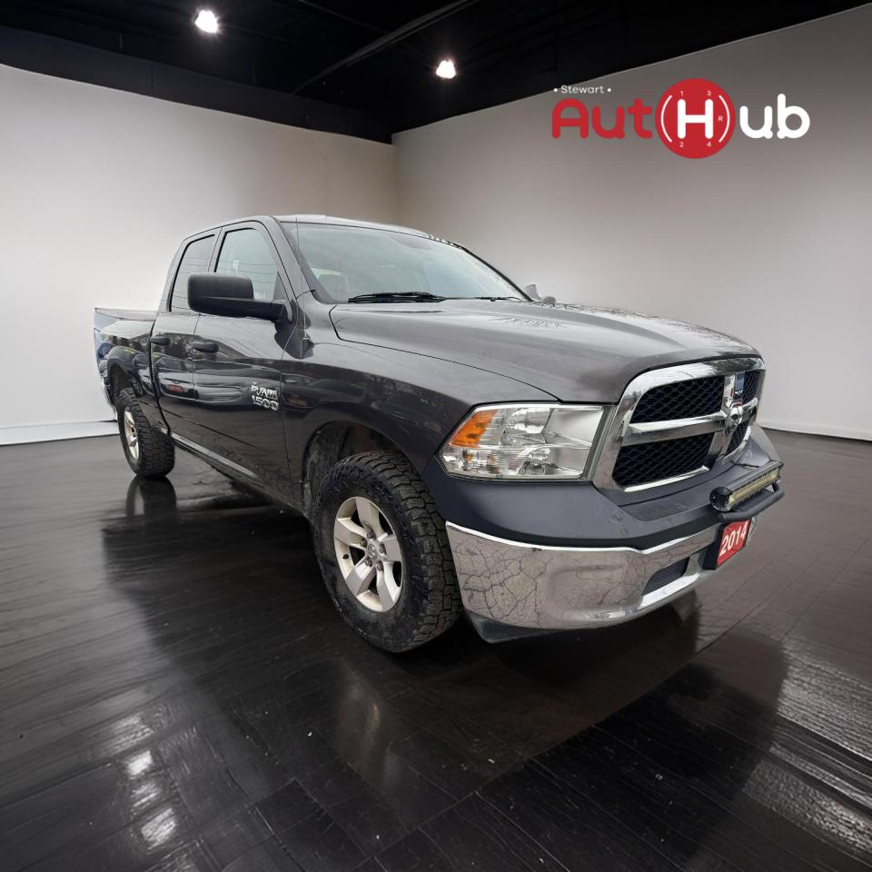 Used 2014 RAM 1500 4WD QUAD CAB 140.5