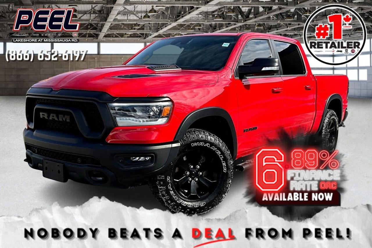 *6.89% promotional interest rate available on approved credit and qualifying vehicles (2022-2025 Preowned Vehicles and demos).  COME SEE WHY NOBODY BEATS A DEAL FROM PEEL! Your Source for ALL make and models used cars and trucks. Canadas #1 Stellantis Retailer for 9 years & counting!!

2022 Ram 1500 Rebel Night Crew Cab 4X4 | 3.0L EcoDiesel Turbocharged V6 | Flame Red | Lux Leather Trimmed Bucket Seats | Uconnect 12" Touchscreen Display w/ Navigation | 19-speaker Harman/Kardon High Performance Audio System | Bed Utility Group | Comfort & Convenience Group | Level 2 Equipment Group | Heated Seats | Heated Steering Wheel | Remote Start | Wireless Smartphone Charging Pad | Apple CarPlay & Android Auto | Second-row Heated Seats | Dual-zone Automatic Climate Control | Remote Proximity Keyless Entry | Park-sense Front & Rear Parking Sensors | 3.92 Rear Axle Ratio | Class IV Hitch Receiver | Trailer Brake Control | Mopar Deployable Bed Step | Spray-in Bed Liner | Sport Performance Hood | 124.9L Fuel Tank

One Owner Clean Carfax

A rare and highly sought-after find, this 2022 Ram 1500 Rebel Night Edition Crew Cab 4X4 is a low-kilometre powerhouse that combines off-road dominance with premium luxury. Powered by the 3.0L EcoDiesel Turbocharged V6, it delivers outstanding torque, fuel efficiency, and long-range capability with its 124.9L fuel tankperfect for adventure seekers and long haulers alike. Finished in Flame Red, this Rebel Night Edition stands out with a Sport Performance Hood, bold blacked-out accents, and aggressive styling. Inside, the Lux Leather-Trimmed Bucket Seats, Heated Front and Second-Row Seats, a Heated Steering Wheel, and Dual-Zone Automatic Climate Control create an upscale and comfortable cabin. The Uconnect 12 Touchscreen with Navigation, Wireless Charging Pad, and a 19-Speaker Harman/Kardon High-Performance Audio System bring cutting-edge tech and immersive sound. Practicality meets power with the Bed Utility Group, Mopar Deployable Bed Step, Spray-In Bed Liner, and Class IV Hitch Receiver with Trailer Brake Control, making towing and cargo management effortless. Advanced safety features like Park-Sense Front & Rear Parking Sensors and Remote Proximity Keyless Entry add convenience and peace of mind. With a One Owner Clean Carfax, this EcoDiesel Rebel Night Edition is a rare opportunity to own one of the most capable, stylish, and fuel-efficient off-road trucks availabledont miss out on this elite Rebel!
______________________________________________________

Engage & Explore with Peel Chrysler: Whether youre inquiring about our latest offers or seeking guidance, 1-866-652-6197 connects you directly. Dive deeper online or connect with our team to navigate your automotive journey seamlessly.

WE TAKE ALL TRADES & CREDIT. WE SHIP ANYWHERE IN CANADA! OUR TEAM IS READY TO SERVE YOU 7 DAYS!
______________________________________________________
Our advertised prices are for consumers (i.e end users) only. 

*FREE CarFax (click the link above to check it out at no cost to you!)*

*FULLY CERTIFIED! (Have you seen some of these other dealers stating in their advertisements that certification is an additional fee? NOT HERE! Our certification is already included in our low sale prices to save you more!)

______________________________________________________

Peel Chrysler  A Trusted Destination: Based in Port Credit, Ontario, we proudly serve customers from all corners of Ontario and Canada including Toronto, Oakville, North York, Richmond Hill, Ajax, Hamilton, Niagara Falls, Brampton, Thornhill, Scarborough, Vaughan, London, Windsor, Cambridge, Kitchener, Waterloo, Brantford, Sarnia, Pickering, Huntsville, Milton, Woodbridge, Maple, Aurora, Newmarket, Orangeville, Georgetown, Stouffville, Markham, North Bay, Sudbury, Barrie, Sault Ste. Marie, Parry Sound, Bracebridge, Gravenhurst, Oshawa, Ajax, Kingston, Innisfil and surrounding areas. On our website www.peelchrysler.com, you will find a vast selection of new vehicles including the new and used Ram 1500, 2500 and 3500. Chrysler Grand Caravan, Chrysler Pacifica, Jeep Cherokee, Wrangler and more. All vehicles are priced to sell. We deliver throughout Canada. website or call us 1-866-652-6197. 

Disclaimer Statement: At Peel Chrysler, your satisfaction is our priority. While many pre-owned vehicles originally come with two keys, variations may occur based on trade-ins, and all Peel Chrysler Pre-Owned Vehicles come standard with one key—any extras provided by the previous owner will be included with your purchase, and additional keys can be bought at the time of sale. Online prices and payments are for finance purchases. Used vehicles that are being financed are subject to a $499 (^$1500 non-prime) financing fee, while cash purchases (certified cheque, bank draft, or wire transfer) on used vehicles have a $2,000 surcharge ( online price + $2,000). Cash purchases of new vehicles only incur applicable taxes and licensing fees, and those priced above $100,000 (including accessories or add-ons) are subject to a federal luxury tax. Optional finance and lease terms are available, and if trading in a vehicle with an outstanding loan balance requiring Peel Chrysler to facilitate the lien payout, a Lien Payout Fee of $349 applies. Prices, rates, and payments are subject to change without notice. While we strive for accuracy, occasional technical or human errors may occur, so we encourage verifying all vehicle details, including features, options, materials, and specifications, with a Peel Chrysler representative by contacting us or visiting our dealership. Experience seamless convenience with our nationwide delivery options—visit our website or contact us for more details.