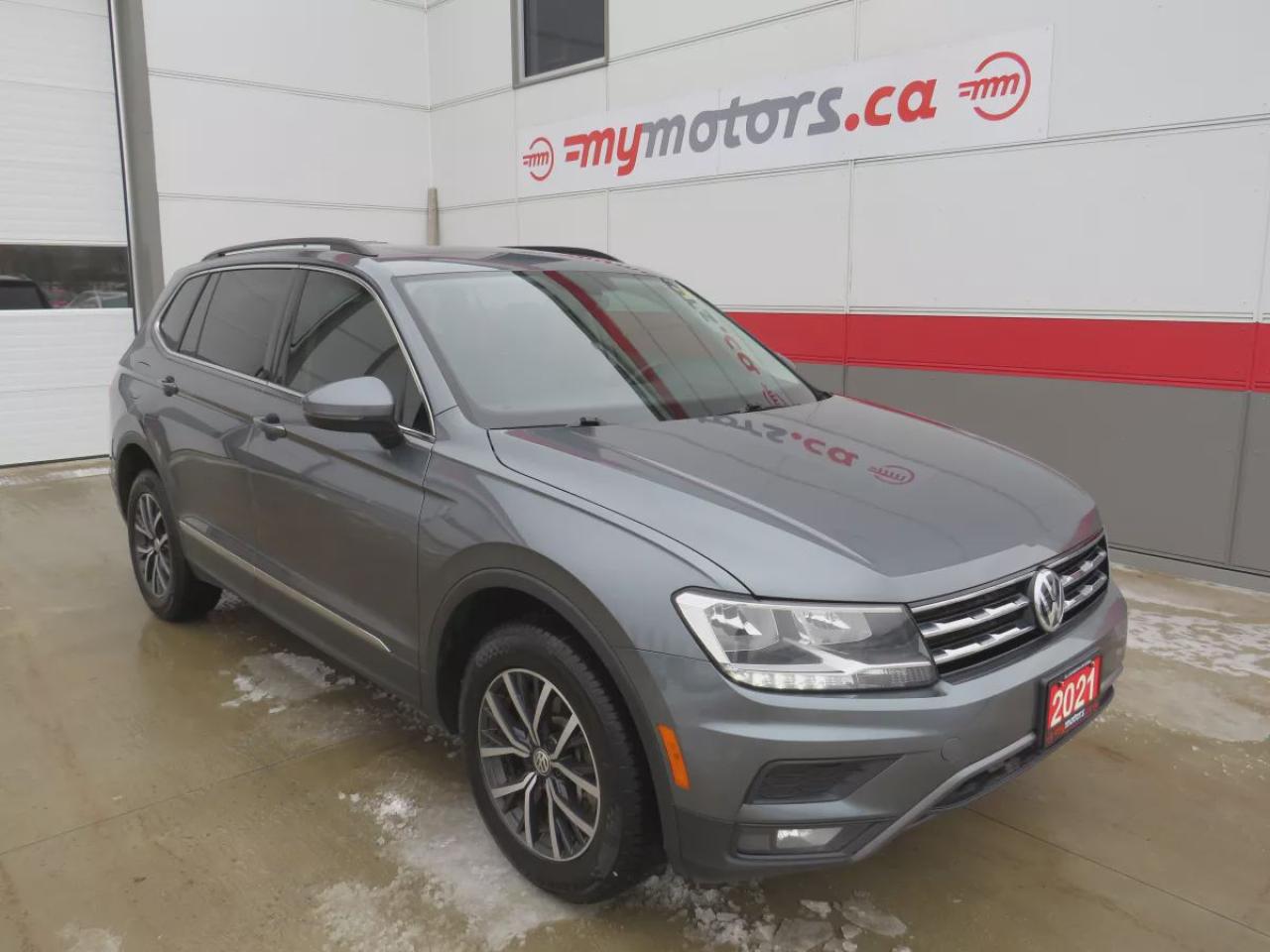 Used 2021 Volkswagen Tiguan United (**AWD**ALLOY WHEELS**LEATHER** POWER DRIVERS SEAT**PANORAMIC SUNROOF**POWER HATCH**CRUISE CONTROL**BLUETOOTH**NAVIGATION**BACKUP CAMERA**HEATED SEATS**DUAL CLIMATE CONTROL**WIRELESS PHONE CHARGER** USB/AUX PORTS**PUSH BUTTON START**) for sale in Tillsonburg, ON