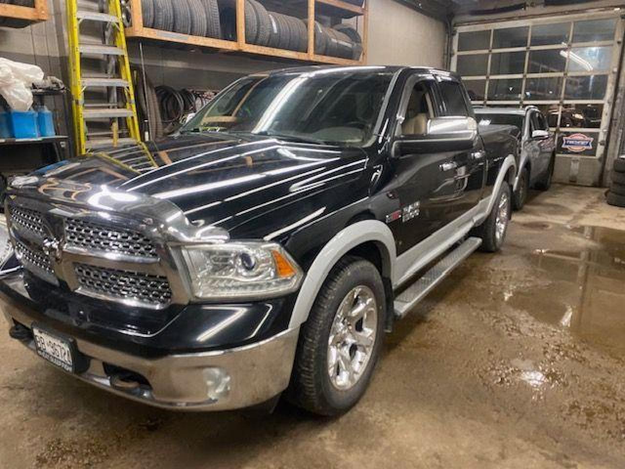 Used 2014 RAM 1500 4WD Quad Cab 140.5