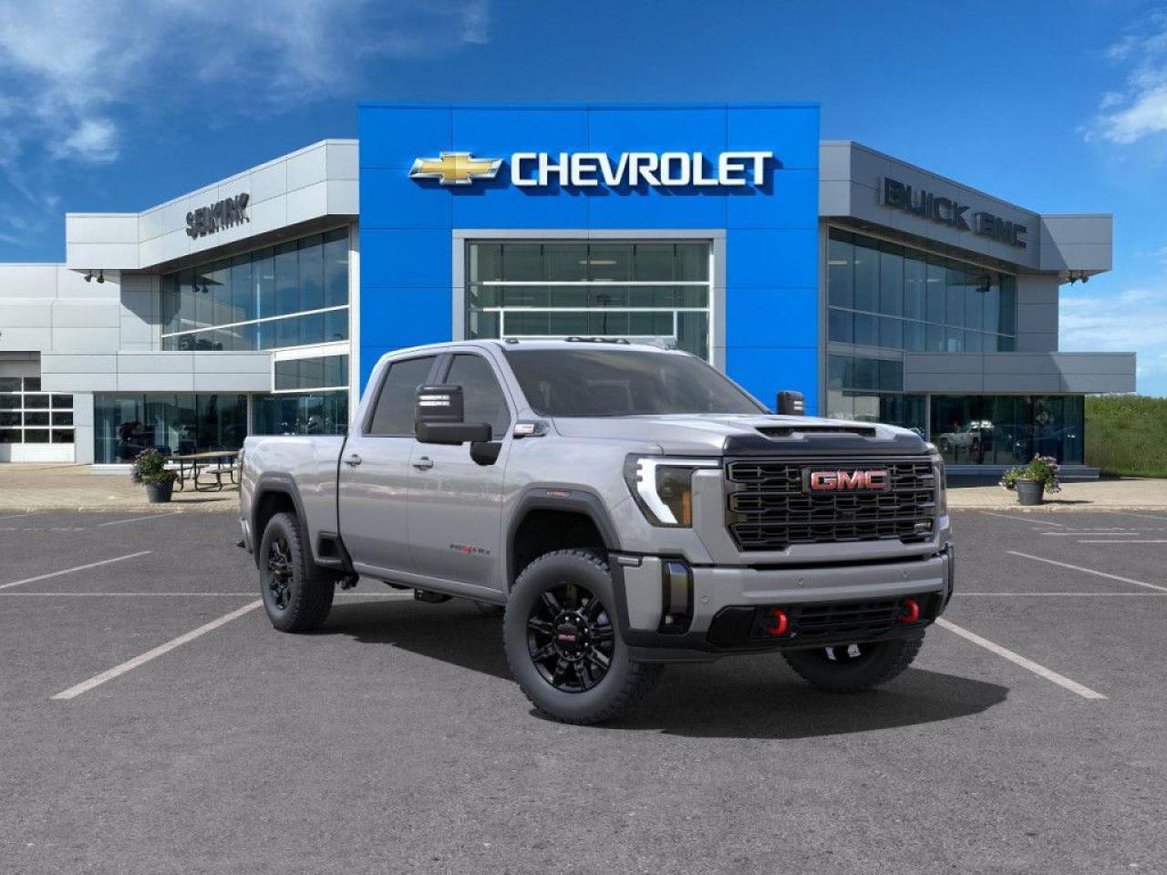 <b>Off-Road Package,  Cooled Seats,  Adaptive Cruise Control,  Wireless Charging,  Park Assist!</b><br> <br> <br> <br>  With stout build quality and astounding towing capability, there isnt a better choice than this GMC 2500HD for all your work-site needs. <br> <br>This 2025 GMC 2500HD is highly configurable work truck that can haul a colossal amount of weight thanks to its potent drivetrain. This truck also offers amazing interior features that nestle occupants in comfort and luxury, with a great selection of tech features. For heavy-duty activities and even long-haul trips, the 2500HD is all the truck youll ever need.<br> <br> This thunderstorm grey metallic sought after diesel Crew Cab 4X4 pickup   has an automatic transmission and is powered by a  470HP 6.6L 8 Cylinder Engine.<br> <br> Our Sierra 2500HDs trim level is AT4. Get ready to tackle the great outdoors with this Sierra HD AT4, complete with an off-road suspension package, skid plates, hill descent control, red recovery hooks, a spray on bedliner and a blacked-out front grille. This sweet truck also comes with leather-trimmed cooled and heated seats, power adjustable pedals with memory settings, a heavy-duty locking rear differential, signature LED lighting, a larger 13.4 inch touchscreen premium infotainment system with wireless Apple CarPlay, Android Auto and 4G LTE capability, stylish aluminum wheels, remote keyless entry and a remote engine start, a CornerStep rear bumper and cargo tie downs hooks with LED box lighting. Additionally, this truck also comes with a useful rear vision camera with hitch guidance, a leather wrapped steering wheel with audio controls, and a ProGrade trailering system with an integrated brake controller. This vehicle has been upgraded with the following features: Off-road Package,  Cooled Seats,  Adaptive Cruise Control,  Wireless Charging,  Park Assist,  Hitch Guidance,  Multi-pro Tailgate. <br><br> <br>To apply right now for financing use this link : <a href=https://www.selkirkchevrolet.com/pre-qualify-for-financing/ target=_blank>https://www.selkirkchevrolet.com/pre-qualify-for-financing/</a><br><br> <br/> Weve discounted this vehicle $4614. Total  cash rebate of $5000 is reflected in the price. Credit includes $5,000 Non-Stackable Cash Delivery Allowance.  Incentives expire 2025-03-31.  See dealer for details. <br> <br>Selkirk Chevrolet Buick GMC Ltd carries an impressive selection of new and pre-owned cars, crossovers and SUVs. No matter what vehicle you might have in mind, weve got the perfect fit for you. If youre looking to lease your next vehicle or finance it, we have competitive specials for you. We also have an extensive collection of quality pre-owned and certified vehicles at affordable prices. Winnipeg GMC, Chevrolet and Buick shoppers can visit us in Selkirk for all their automotive needs today! We are located at 1010 MANITOBA AVE SELKIRK, MB R1A 3T7 or via phone at 204-482-1010.<br> Come by and check out our fleet of 40+ used cars and trucks and 250+ new cars and trucks for sale in Selkirk.  o~o