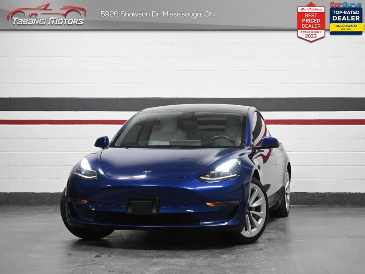 <b>Autopilot, Blindspot Camera, White Leather, Lane Departure Warning, Forward Collision Warning, Auto Emergency Braking, Obstacle-aware Acceleration, Netflix, Disney+, YouTube supported, Front & Rear Heated Seats!</b><br>  Tabangi Motors is family owned and operated for over 20 years and is a trusted member of the Used Car Dealer Association (UCDA). Our goal is not only to provide you with the best price, but, more importantly, a quality, reliable vehicle, and the best customer service. Visit our new 25,000 sq. ft. building and indoor showroom and take a test drive today! Call us at 905-670-3738 or email us at customercare@tabangimotors.com to book an appointment. <br><hr></hr>CERTIFICATION: Have your new pre-owned vehicle certified at Tabangi Motors! We offer a full safety inspection exceeding industry standards including oil change and professional detailing prior to delivery. Vehicles are not drivable, if not certified. The certification package is available for $595 on qualified units (Certification is not available on vehicles marked As-Is). All trade-ins are welcome. Taxes and licensing are extra.<br><hr></hr><br> <br>   Ranging from an accessible and affordable FEV to a real hot performance sedan, this Model 3 is ready to change the game. This  2021 Tesla Model 3 is for sale today in Mississauga. <br> <br>When designing the Model 3, the engineers at Tesla had two main goals: family safety, and affordability. Somewhere along the way, they took it to a whole new level with better technology and luxury features than most other cars at its price point. Every trim level of the Model 3 comes with Tesla Autopilot, a video streaming family entertainment system, and a glass roof that provides a beautiful open air experience to each passenger. If youre ready for the future, look no further than this Model 3.This  sedan has 59,452 kms. Its  blue in colour  . It has an automatic transmission and is powered by a  Motor: AC Permanent Magnet -inc: 423 km estimated range engine.  It may have some remaining factory warranty, please check with dealer for details.  This vehicle has been upgraded with the following features: Air, Rear Air, Cruise, Tilt, Power Windows, Power Locks, Power Mirrors. <br> <br>To apply right now for financing use this link : <a href=https://tabangimotors.com/apply-now/ target=_blank>https://tabangimotors.com/apply-now/</a><br><br> <br/><br>SERVICE: Schedule an appointment with Tabangi Service Centre to bring your vehicle in for all its needs. Simply click on the link below and book your appointment. Our licensed technicians and repair facility offer the highest quality services at the most competitive prices. All work is manufacturer warranty approved and comes with 2 year parts and labour warranty. Start saving hundreds of dollars by servicing your vehicle with Tabangi. Call us at 905-670-8100 or follow this link to book an appointment today! https://calendly.com/tabangiservice/appointment. <br><hr></hr>PRICE: We believe everyone deserves to get the best price possible on their new pre-owned vehicle without having to go through uncomfortable negotiations. By constantly monitoring the market and adjusting our prices below the market average you can buy confidently knowing you are getting the best price possible! No haggle pricing. No pressure. Why pay more somewhere else?<br><hr></hr>WARRANTY: This vehicle qualifies for an extended warranty with different terms and coverages available. Dont forget to ask for help choosing the right one for you.<br><hr></hr>FINANCING: No credit? New to the country? Bankruptcy? Consumer proposal? Collections? You dont need good credit to finance a vehicle. Bad credit is usually good enough. Give our finance and credit experts a chance to get you approved and start rebuilding credit today!<br> o~o