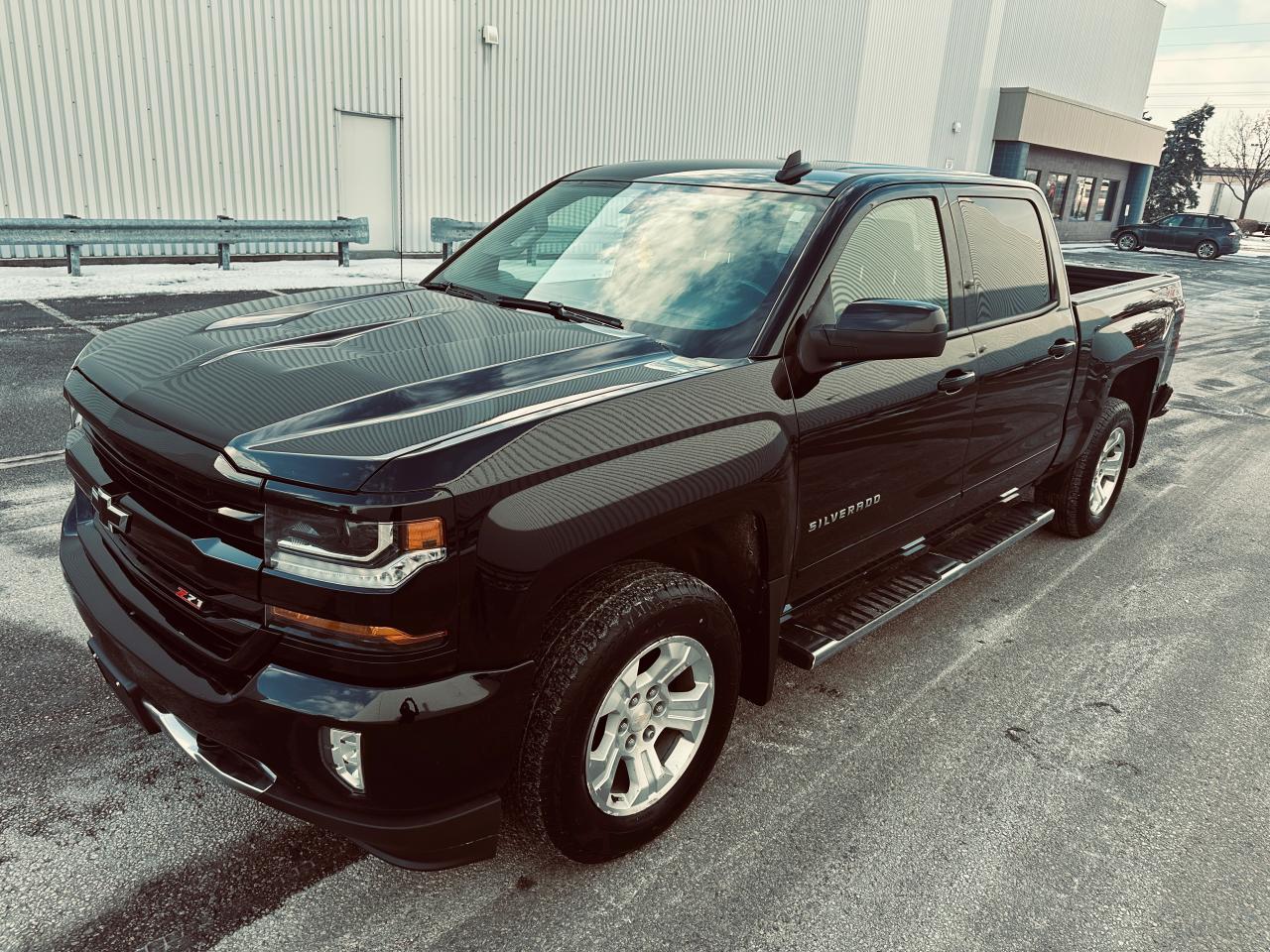 <p><img src=https://cdn.carfax.ca/vehicle-history/images/1.0.0/Badges/accident-free@1x.svg alt=Accident Free /></p><p style=background-color: #ffffff;>TRIPLE BLACK CREW CAB 2LT Z71 OFF ROAD SHORT BOX, MIDDLE CONSOLE, FRONT INDIVIDUAL HEATED POWER SEATS, FACTORY NAVIGATION & BACKUP ASSIST, WI-FII IN A TOUCH SCREEN, LEATHER HEATED STEERING WHEEL, GM FACTORY TRAILING PACKAGE, LED LIGHTING, SPRAY-IN BED LINER, RUNNING BOARDS, ETC.</p><p style=background-color: #ffffff;>NO REPORTED ACCIDENTS ACCORDING TO CARFAX HISTORY REPORT ( VERIFIED ) SHOWING ALSO A SINGLE PERSONAL ONTARIO OWNERSHIP SINCE NEW, 5.3 LITRE V8 - 6 SPEED TRANSMISSION, 4WD, GREAT SHAPE & CONDITION. </p><p style=box-sizing: border-box; padding: 0px; margin: 0px 0px 1.375rem; background-color: #ffffff;><span style=box-sizing: border-box; font-size: small; color: #222222; font-family: Arial, Helvetica, sans-serif;>Priced to sell certified, Price plus $ 299 For New Ontario Safety Standard Certificate Plus $12.50 Omvic Fee Plus HST plus $ 91 license fee Including New Plates, Our truck Centre has new daily arrival of quality pick-up trucks and full-sized SUVs. As peace of mind, we offer extended warranties for what we sell up to (3) years for extra charges. Please ask sales for details.</span></p><p style=box-sizing: border-box; padding: 0px; margin: 0px 0px 1.375rem; background-color: #ffffff; color: #222222; font-family: Arial, Helvetica, sans-serif; font-size: small;><strong style=box-sizing: border-box;>Please call us before making your arrival to our store to make an appointment and to make sure the truck you are coming to purchase is still available for sale.</strong></p><p style=box-sizing: border-box; padding: 0px; margin: 0px 0px 1.375rem; background-color: #ffffff; color: #222222; font-family: Arial, Helvetica, sans-serif; font-size: small;><strong style=box-sizing: border-box;>To look at our inventory please go to : MJCANADATRUCKSCENTRE.CA</strong></p><p style=box-sizing: border-box; padding: 0px; margin: 0px 0px 1.375rem;><strong style=box-sizing: border-box;>QUALITY & TRUST, CERTIFIED PRE-OWNED TRUCKS CENTRE</strong></p>