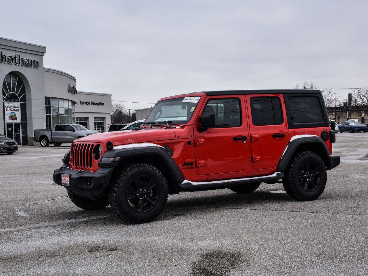 <p>Ready to drive a true legend? The 2022 Jeep Wrangler Unlimited Sport Altitude in Firecracker Red Clearcoat is an iconic off-roading beast that combines rugged style and unmatched performanceand its one of the rare gems with a manual transmission! This 4D Sport Utility vehicle is powered by the legendary Pentastar 3.6L V6 engine and paired with a 6-speed manual transmission, giving you full control over every adventure.</p><p>This Jeep is decked out with black accents, including a body-color grille with gloss black detailing, matte black Jeep badge, and molded-in-color fender flares, giving it that sleek, aggressive look. The Black Freedom Top 3-piece hardtop lets you adjust your ride to suit the weather, while the Freedom Panel Storage Bag ensures you're always ready for open-air fun.</p><p>Inside, youll enjoy all the creature comforts that make every journey a pleasure, with front heated seats, a heated steering wheel, dual-zone A/C, and a leather-wrapped steering wheel. The Alpine Premium Audio System, combined with Apple CarPlay/Android Auto, ensures youre always connected and entertained. With the Technology Group and SiriusXM Satellite Radio, youre equipped for any adventure, no matter how far off the beaten path it takes you.</p><p>Safety features like the ParkView rear backup camera, LED headlamps, and heavy-duty suspension with gas shocks mean you can tackle any terrain with confidence. Whether youre cruising on the highway or off-roading with friends, this Jeep is ready for it all!</p><p>Stop by Chatham Chrysler to check out this rare, manual-transmission 2022 Jeep Wrangler Unlimited Sport Altitude. With our expert Financial Services team, were here to help you make this epic ride yours. Whether you're in London, Windsor, or anywhere in betweenWE CAN DO IT!</p>