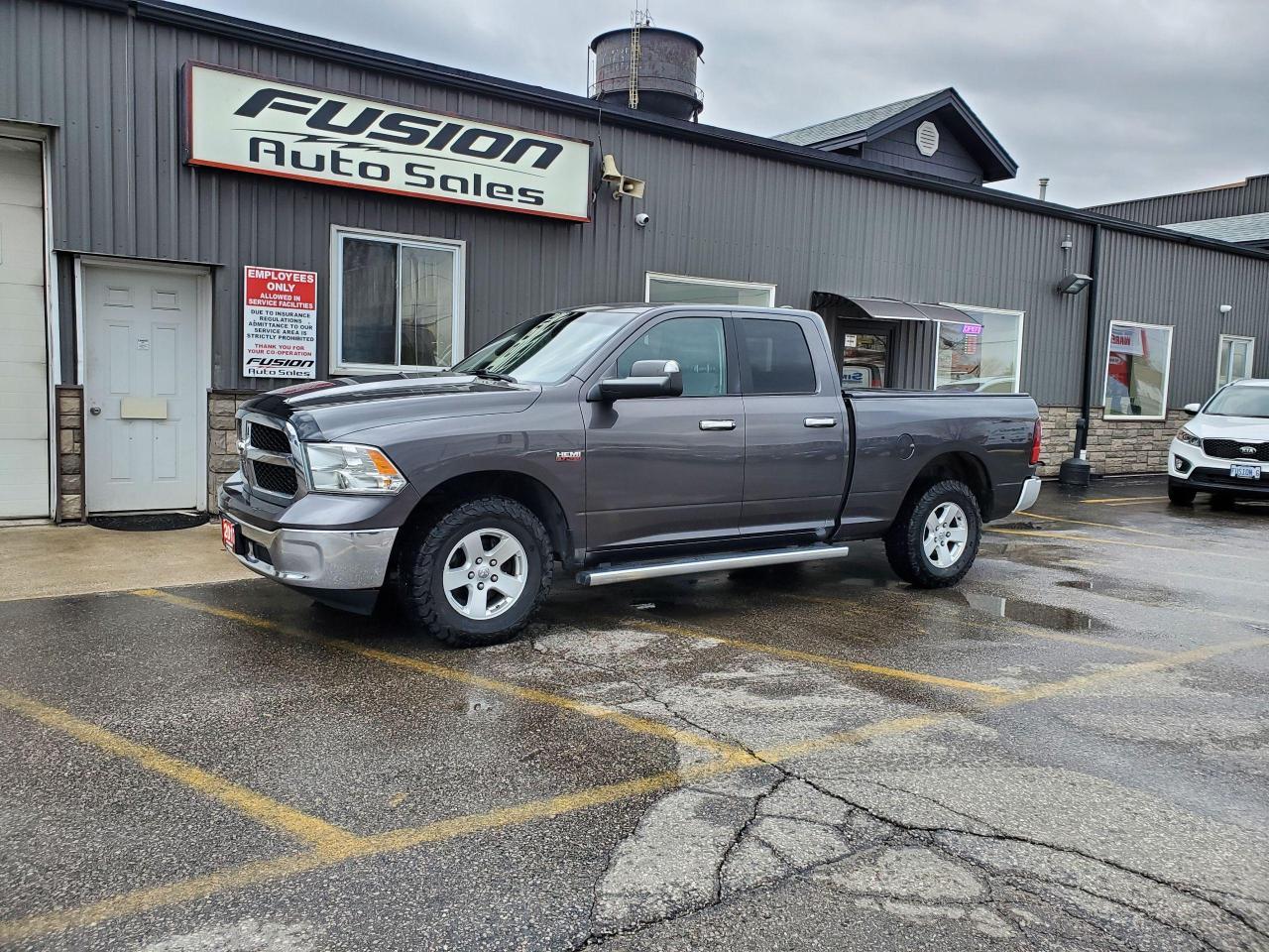 2017 RAM 1500 4WD Quad Cab 140.5" SLT - Photo #1