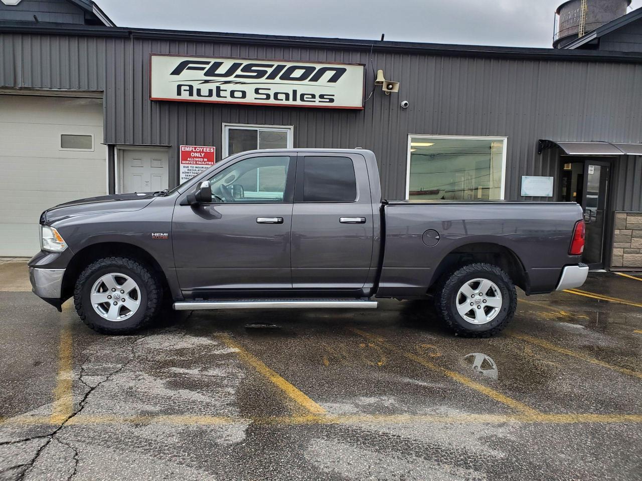 2017 RAM 1500 4WD Quad Cab 140.5" SLT - Photo #2