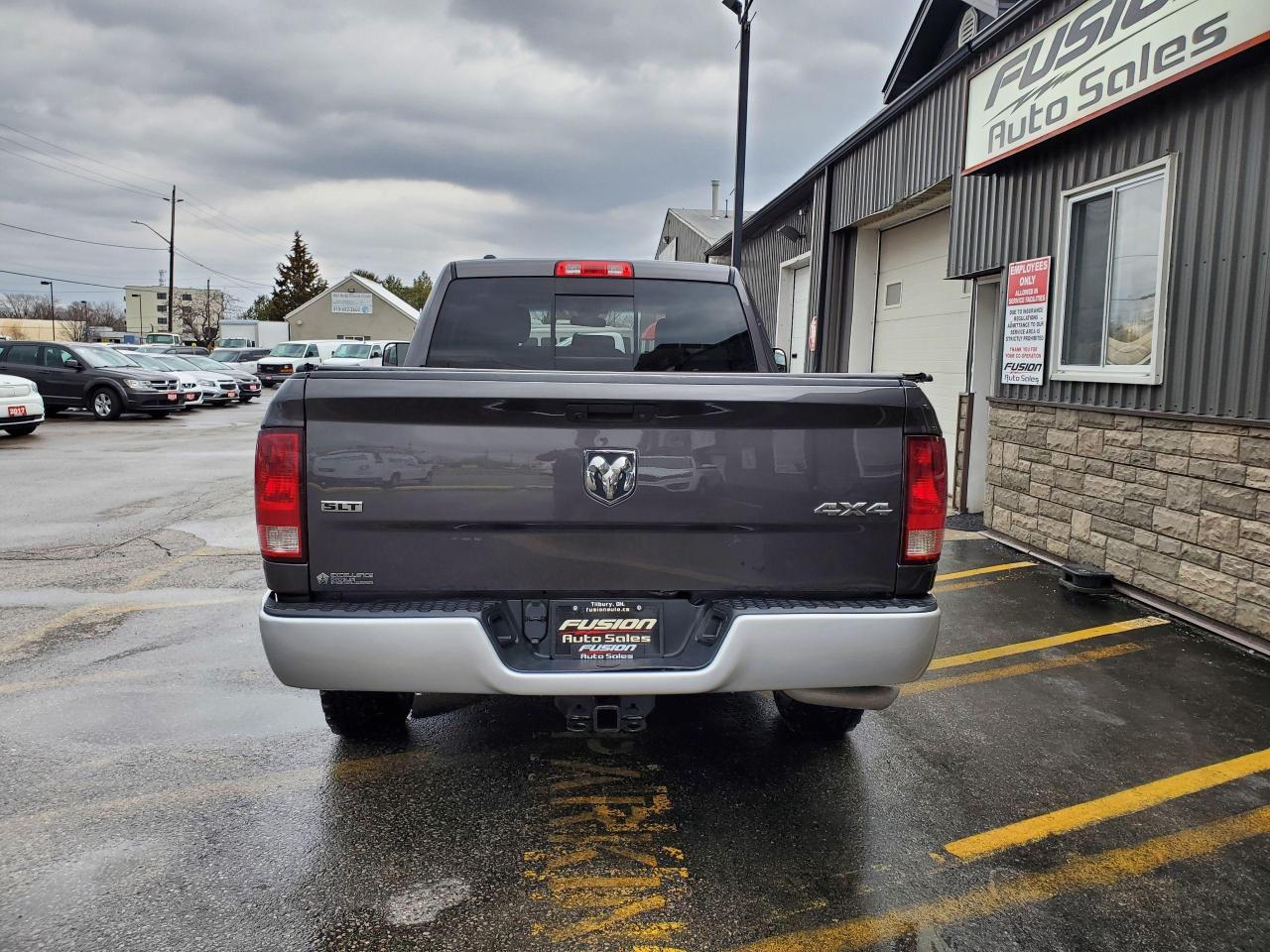 2017 RAM 1500 4WD Quad Cab 140.5" SLT - Photo #4