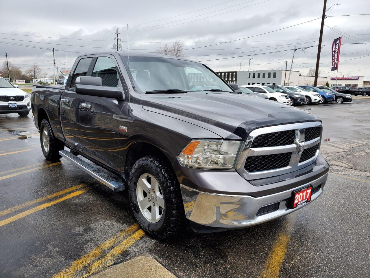 2017 RAM 1500 4WD Quad Cab 140.5" SLT - Photo #6