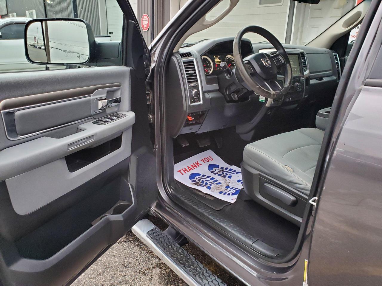 2017 RAM 1500 4WD Quad Cab 140.5" SLT - Photo #10