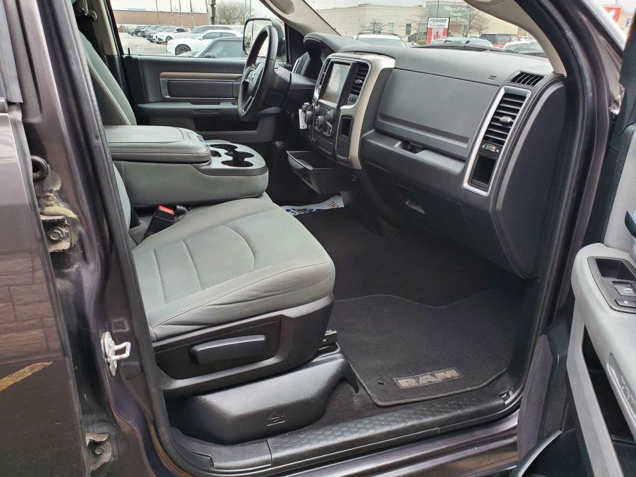2017 RAM 1500 4WD Quad Cab 140.5" SLT - Photo #11