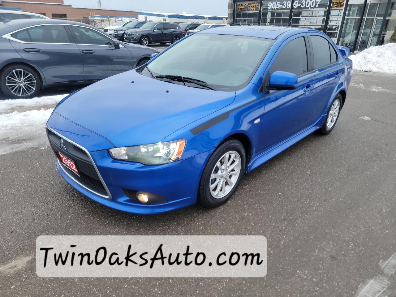 <p><strong>For Sale: Low-KM 2012 Mitsubishi Lancer SE – Loaded & Immaculate!</strong></p><p>Looking for a reliable, sporty sedan with premium features? This <strong>2012 Mitsubishi Lancer SE</strong> is the perfect choice!</p><p>✅ <strong>Low KM</strong> – Gently driven and well-maintained<br />✅ <strong>Luxury Features</strong> – Leather seats, sunroof & heated seats for ultimate comfort<br />✅ <strong>Exceptionally Clean</strong> – Inside and out, this car is in fantastic condition<br />✅ <strong>Fuel Efficient & Fun to Drive</strong> – Great on gas without sacrificing performance</p><p>Dont miss out on this <strong>well-equipped, low-mileage Lancer</strong>—it won’t last long! Call or message today for a test drive. 🚗💨</p><p> </p><p><strong>Additional Certification Cost</strong>: The full certification cost for this vehicle is <strong>$790 + HST</strong>.</p><p><strong>What’s Included with Certification</strong>:</p><ul><li>The vehicle will be delivered with a <strong>valid safety certification</strong> and a <strong>36-day safety item warranty</strong> for your peace of mind.</li><li>A <strong>fresh oil change</strong> will be performed, and all fluids will be topped up.</li><li>The vehicle will be <strong>professionally detailed</strong>, ensuring it looks and feels like new when you pick it up.</li></ul><p>At <strong>Twin Oaks Auto</strong>, we are committed to providing a <strong>hassle-free car buying experience</strong>. From your first inquiry to driving off in your new car, our goal is to get you on the road quickly and stress-free!</p><p><strong>Financing Options Available!</strong><br />Flexible financing options are available to suit your needs. Contact us for more details.</p><p><strong>Contact Us Today</strong>:<br />📞 <strong>Call Us</strong>: 905-339-3330<br />📍 <strong>Location</strong>: 2470 Royal Windsor Drive, Oakville, Ontario, L6J 7Y2</p><p><br />(Conveniently located between Ford Drive and Winston Churchill Blvd.)</p><p><strong>More Information</strong>:<br />Visit our website at <strong><a href=http://www.twinoaksauto.com>TwinOaksAuto.com</a></strong> to view additional pictures, explore our inventory, and access CARFAX reports.</p><p> </p><p> </p>