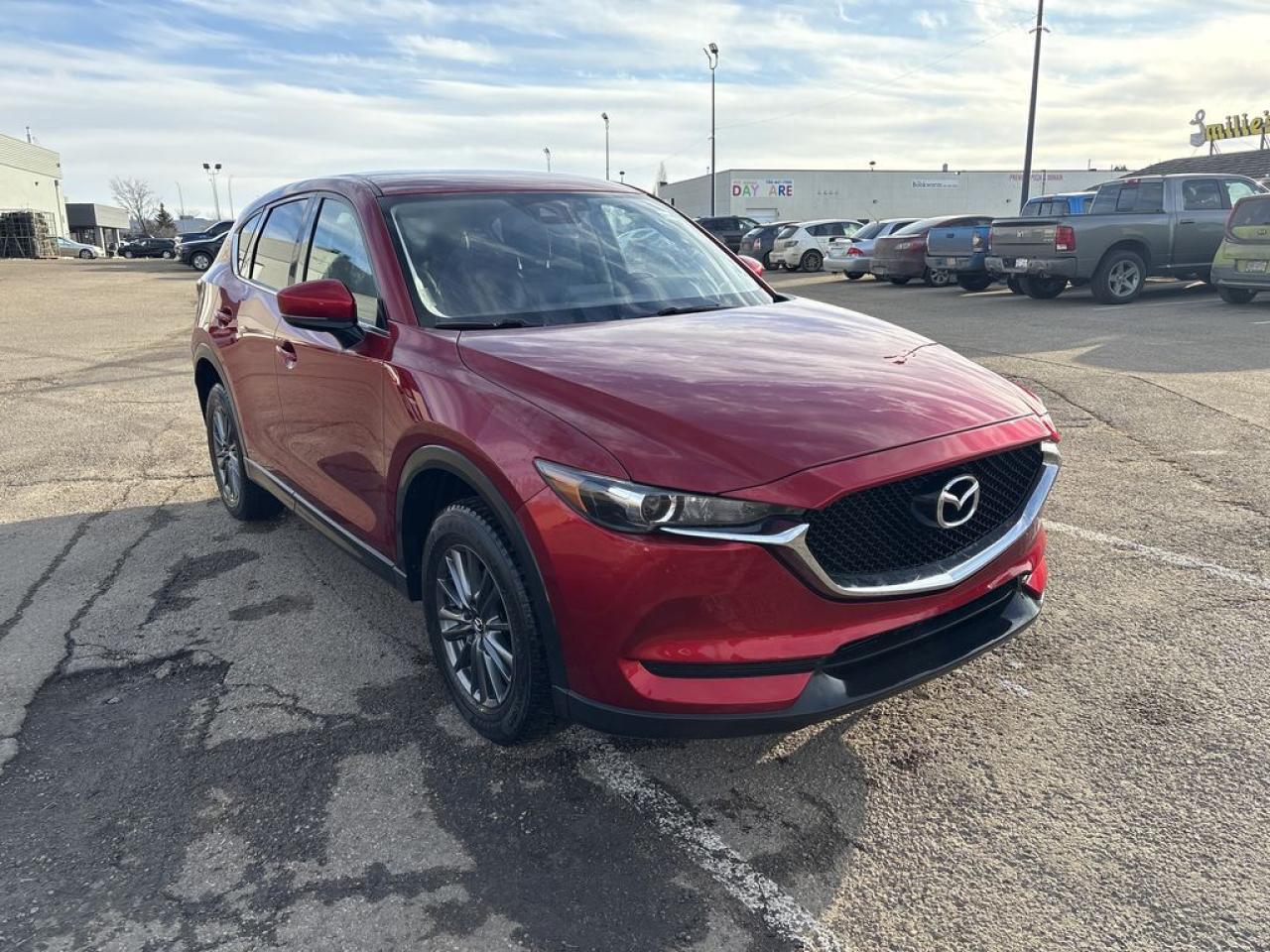 <p>Meet the 2018 Mazda CX-5 GS AWDthe stylish, fun-to-drive SUV that brings practicality and excitement together in one sleek package. Powered by a 2.5L 4-cylinder engine with 187 hp, this CX-5 delivers a smooth yet responsive ride, perfect for city streets or weekend getaways. Plus, with all-wheel drive, youre ready for whatever the road (or weather) throws your way.</p>  <p>Step inside, and youre greeted by a refined interior featuring heated front seats, a heated steering wheel, and a power-adjustable drivers seatbecause comfort matters. The 7-inch touchscreen infotainment system with Apple CarPlay and Android Auto keeps you connected, while smart safety features like blind-spot monitoring and rear cross-traffic alert give you peace of mind.</p>  <p>With ample cargo space, a stylish design, and Mazdas signature zoom-zoom driving dynamics, the 2018 CX-5 GS AWD is the perfect balance of sportiness and practicality. Whether youre commuting, road-tripping, or tackling winter roads, this SUV has your back in style.</p>  <p>Ready to elevate your drive? The CX-5 GS AWD is waiting!</p>  <p>Call 587-409-5859 for more info or to schedule an appointment! Fully Inspected, ALL Work Complete and Included in Price! Listed Pricing is valid for 72 hours. Price listed is a finance price only and includes a finance rebate. This vehicles Cash Price is listed and available on our dealer website at parkmazda dot ca. Financing is available, please see dealer for term availability and interest rates. AMVIC Licensed Business.</p>