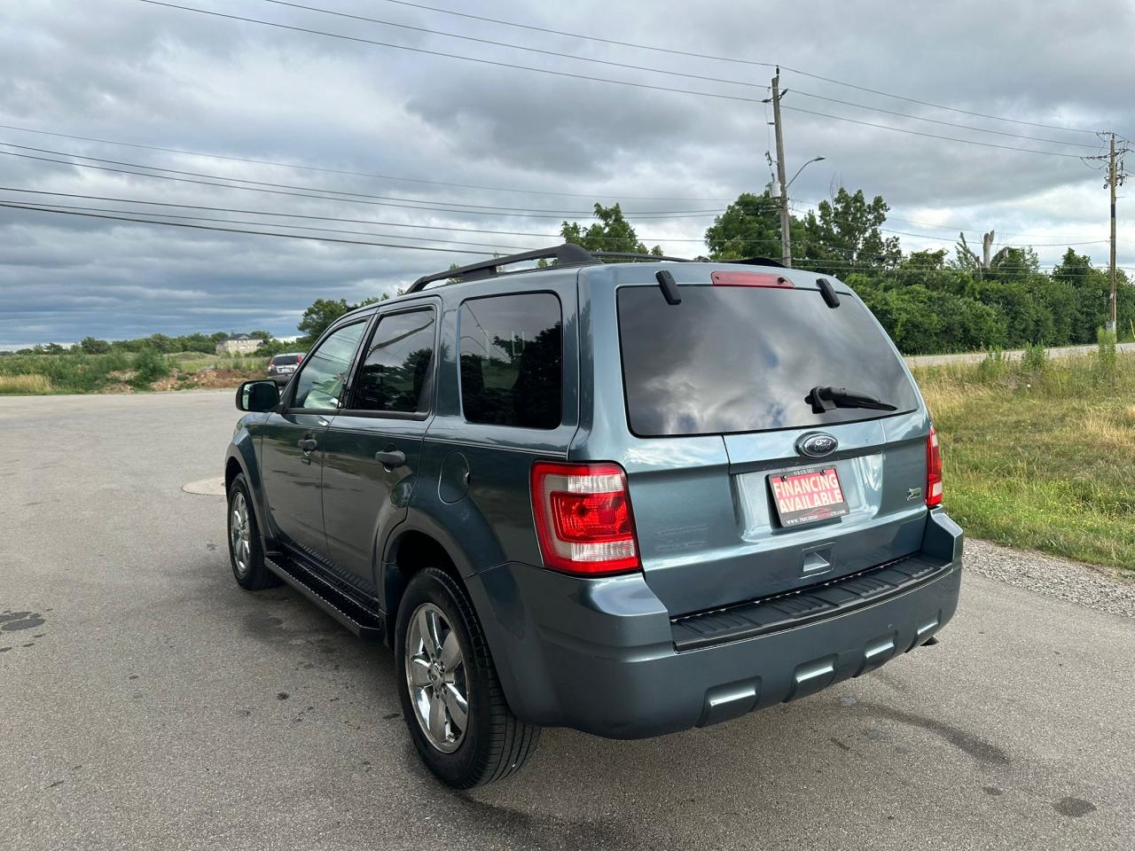 2010 Ford Escape 4WD 4DR V6 AUTO XLT Photo3