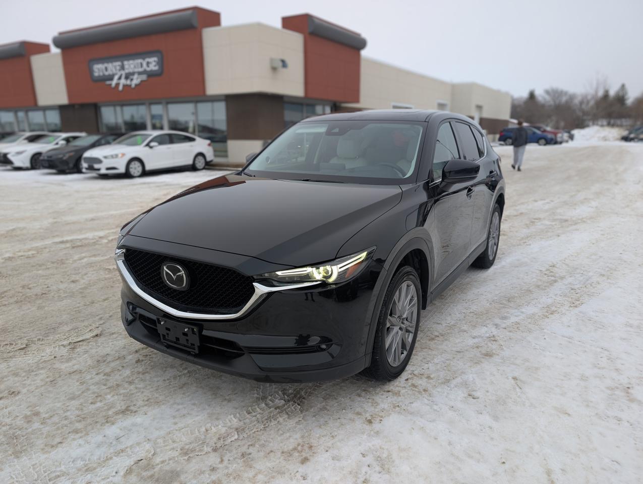 <p>Come finance with us. Apply at stonebridgeauto.com</p><p>&nbsp;</p><p>2021 Mazda CX-5 GT with 63000km. 2.5L 4 cylinder AWD. Clean title and safetied. Accident free.&nbsp;</p><p>&nbsp;</p><p>Leather interior</p><p>Heated steering wheel</p><p>Heated and cooled seats</p><p>Dual climate control</p><p>Adaptive cruise control&nbsp;</p><p>Blind spot monitoring</p><p>Navigation</p><p>Back up camera</p><p>Bluetooth</p><p>Power liftgate</p><p>Sunroof</p><p>&nbsp;</p><p>We take trades! Vehicle is for sale in Steinbach by STONE BRIDGE AUTO INC. Dealer #5000 we are a small business focused on customer satisfaction. Text or call before coming to view and</p><p>ask for sales.</p><p>&nbsp;</p><p>&nbsp;</p>