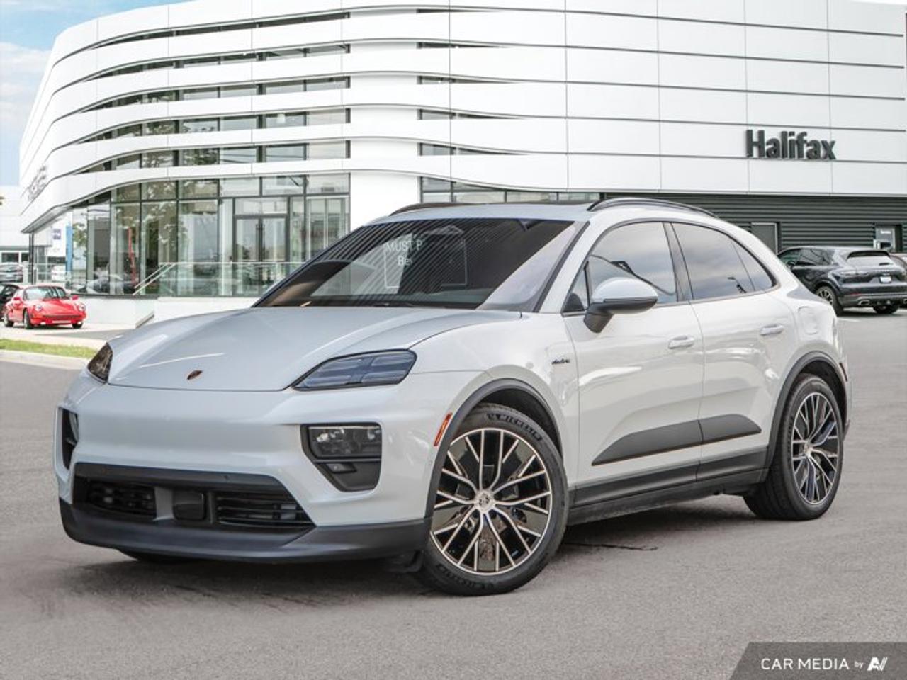 *Now available at Porsche of Halifax*, the *2025 Macan 4 Electric* blends Porsches performance heritage with advanced electric mobility. Finished in *White* with a premium *Black Leather Interior*, this all-electric SUV delivers a bold, modern presence while offering exceptional comfort and technology.==== Performance & Driving Dynamics ====The Macan 4 Electric features instant electric torque and Porsches renowned chassis tuning, ensuring a spirited driving experience. Key enhancements include:  *   *Sport Chrono Package* for sharper acceleration and sportier drive modes  *   *Porsche Electric Sport Sound* for an engaging auditory experience  *   *Power Steering Plus* for precise yet effortless control==== Exterior Highlights ====  *   *21 Macan Design Wheels* for a commanding road presence  *   *LED-Matrix Design Headlights* for optimal visibility  *   *Roof Rails in Black Aluminum* for added practicality  *   *Model Designation in High Gloss Black* with electric logo accents  *   *Under Door Puddle Light Projectors* for a premium nighttime touch==== Interior Comfort & Innovation ====  *   *Adaptive Sport Seats (18-way)* with Comfort Memory Package  *   *Ventilated Front Seats* and *Heated Rear Seats* for year-round comfort  *   *BOSE® Surround Sound System* for crystal-clear audio  *   *Advanced 4-Zone Climate Control* for individualized passenger comfort  *   *Heated GT Sport Steering Wheel in Leather* and *Heated Windshield*  *   *Noise & Thermal Insulated Glass* for a quiet, refined cabin  *   *Illuminated PORSCHE Logo on Front Seats* for an exclusive detail==== Technology & Assistance ====  *   *Augmented Reality Head-Up Display* for enhanced driving awareness  *   *Preparation for Porsche Dashcam* (Front and Rear)  *   *Trailer Hitch (without tow ball)* for added versatility==== Premium Package ====This Macan 4 Electric includes the *Premium Package*, combining comfort, technology, and design features to elevate every drive.----------------------------------------The *2025 Macan 4 Electric* represents the future of Porsche performance---silent, powerful, and luxuriously equipped. *Now at Porsche of Halifax*, its ready for its next driver. Contact us to schedule your private showing or test drive.