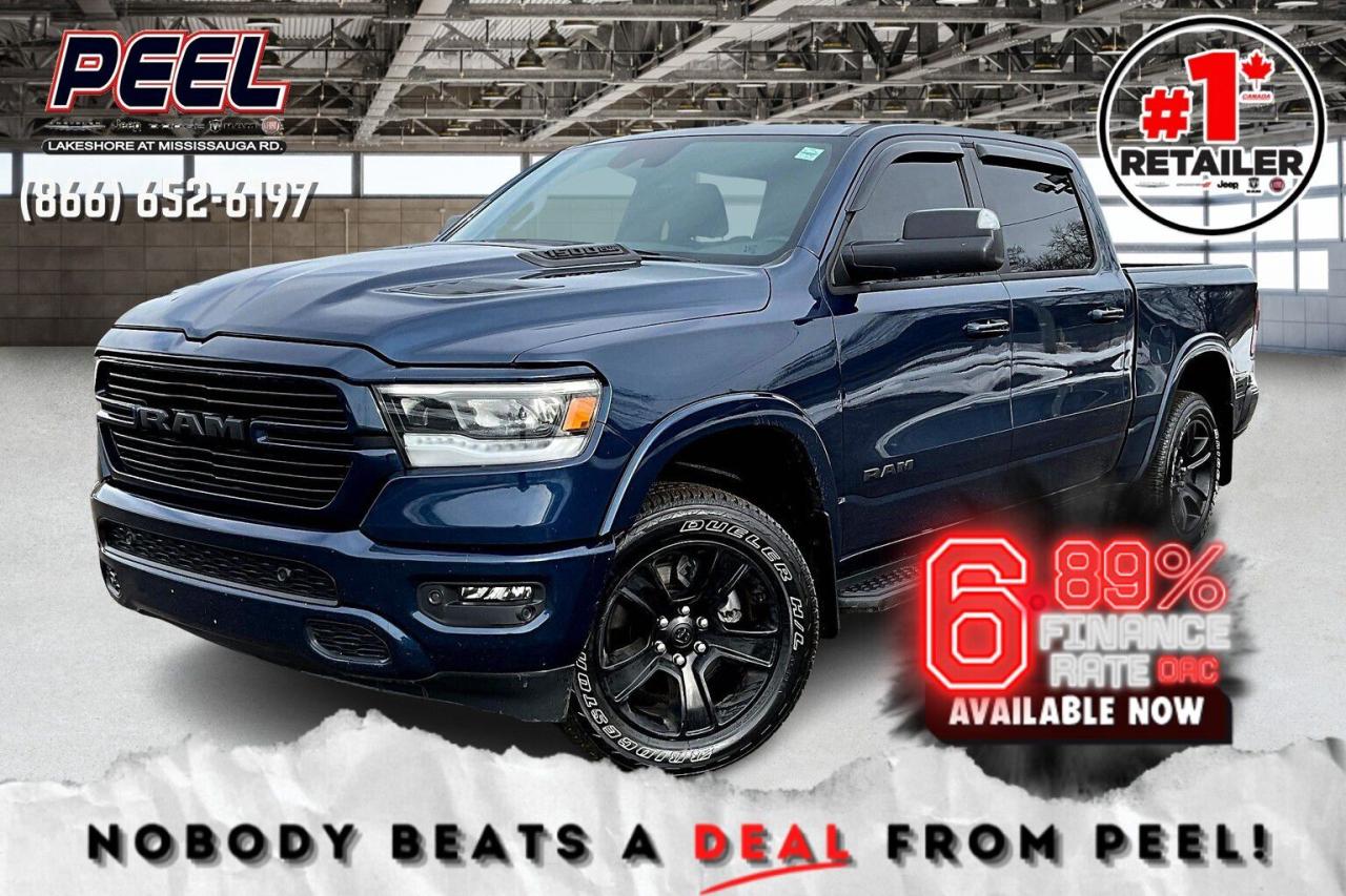 *6.89% promotional interest rate available on approved credit and qualifying vehicles (2022-2025 Preowned Vehicles and demos).  COME SEE WHY NOBODY BEATS A DEAL FROM PEEL! Your Source for ALL make and models used cars and trucks. Canadas #1 Stellantis Retailer for 9 years & counting!!

2022 Ram 1500 Sport Crew Cab 4X4 | 5.7L V8 | Patriot Blue Pearl | Heated Bucket Seats | Uconnect 12" Display w/ Navigation | Level 2 Equipment Group | Alpine Premium Audio System | Apple CarPlay & Android Auto | Heated Steering Wheel | Remote Start | Front & Rear Parking Sensors | Forward Collision Warning | Sport Performance Hood | Remote Proximity Keyless Entry | Dual-zone Automatic Climate Control | Mopar Black Side Steps | Spray-in Bed Liner | Class IV Hitch Receiver | 3.92 Rear Axle Ratio | Trailer Brake Control | Anti-spin Differential Rear Axle | Tow Mirrors | Mopar All-weather Floor Mats | Mud Flaps

One Owner Clean Carfax

Built for power, style, and modern capability, this 2022 Ram 1500 Sport Crew Cab 4X4 in Patriot Blue Pearl is the perfect blend of performance and premium features. Under the hood, the legendary 5.7L HEMI V8 delivers robust towing power, enhanced by a 3.92 Rear Axle Ratio, Anti-Spin Differential, Trailer Brake Control, and Class IV Hitch Receiver, making it ready for any haul. The aggressive Sport Performance Hood and Mopar Black Side Steps add a bold, muscular look, while the Spray-In Bed Liner and Tow Mirrors make work easier. Inside, the Heated Bucket Seats, Heated Steering Wheel, and Dual-Zone Automatic Climate Control ensure maximum comfort, while the Uconnect 12 Touchscreen with Navigation, Apple CarPlay & Android Auto, and Alpine Premium Audio System provide cutting-edge technology and premium sound. Front & Rear Parking Sensors, Forward Collision Warning, and Remote Proximity Keyless Entry add confidence and convenience. With Mopar All-Weather Floor Mats and Mud Flaps for extra protection and a One Owner Clean Carfax, this Ram 1500 Sport is the ultimate combination of muscle, luxury, and smart towing capabilitydont miss your chance to own this standout truck
______________________________________________________

Engage & Explore with Peel Chrysler: Whether youre inquiring about our latest offers or seeking guidance, 1-866-652-6197 connects you directly. Dive deeper online or connect with our team to navigate your automotive journey seamlessly.

WE TAKE ALL TRADES & CREDIT. WE SHIP ANYWHERE IN CANADA! OUR TEAM IS READY TO SERVE YOU 7 DAYS!
______________________________________________________
Our advertised prices are for consumers (i.e end users) only. 

*FREE CarFax (click the link above to check it out at no cost to you!)*

*FULLY CERTIFIED! (Have you seen some of these other dealers stating in their advertisements that certification is an additional fee? NOT HERE! Our certification is already included in our low sale prices to save you more!)

______________________________________________________

Peel Chrysler  A Trusted Destination: Based in Port Credit, Ontario, we proudly serve customers from all corners of Ontario and Canada including Toronto, Oakville, North York, Richmond Hill, Ajax, Hamilton, Niagara Falls, Brampton, Thornhill, Scarborough, Vaughan, London, Windsor, Cambridge, Kitchener, Waterloo, Brantford, Sarnia, Pickering, Huntsville, Milton, Woodbridge, Maple, Aurora, Newmarket, Orangeville, Georgetown, Stouffville, Markham, North Bay, Sudbury, Barrie, Sault Ste. Marie, Parry Sound, Bracebridge, Gravenhurst, Oshawa, Ajax, Kingston, Innisfil and surrounding areas. On our website www.peelchrysler.com, you will find a vast selection of new vehicles including the new and used Ram 1500, 2500 and 3500. Chrysler Grand Caravan, Chrysler Pacifica, Jeep Cherokee, Wrangler and more. All vehicles are priced to sell. We deliver throughout Canada. website or call us 1-866-652-6197. 

Disclaimer Statement: At Peel Chrysler, your satisfaction is our priority. While many pre-owned vehicles originally come with two keys, variations may occur based on trade-ins, and all Peel Chrysler Pre-Owned Vehicles come standard with one key—any extras provided by the previous owner will be included with your purchase, and additional keys can be bought at the time of sale. Online prices and payments are for finance purchases. Used vehicles that are being financed are subject to a $499 (^$1500 non-prime) financing fee, while cash purchases (certified cheque, bank draft, or wire transfer) on used vehicles have a $2,000 surcharge ( online price + $2,000). Cash purchases of new vehicles only incur applicable taxes and licensing fees, and those priced above $100,000 (including accessories or add-ons) are subject to a federal luxury tax. Optional finance and lease terms are available, and if trading in a vehicle with an outstanding loan balance requiring Peel Chrysler to facilitate the lien payout, a Lien Payout Fee of $349 applies. Prices, rates, and payments are subject to change without notice. While we strive for accuracy, occasional technical or human errors may occur, so we encourage verifying all vehicle details, including features, options, materials, and specifications, with a Peel Chrysler representative by contacting us or visiting our dealership. Experience seamless convenience with our nationwide delivery options—visit our website or contact us for more details.