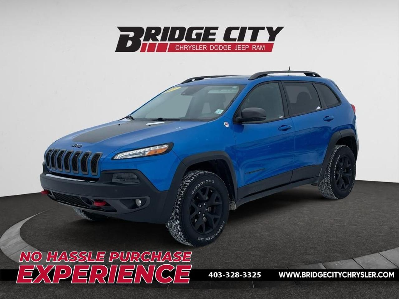 <b>3.2L V6 - Leather Plus Pkg - Alpine Sound - Blind Spot - Trailer Tow - Low Kms<br> <br></b><br>     Aiming to be more than another run-of-the-mill crossover, the Cherokee brings a measure of ruggedness to the party in the way only a Jeep can, says Car and Driver. This  2017 Jeep Cherokee is fresh on our lot in Lethbridge. <br> <br>When the freedom to explore arrives alongside exceptional value, the world opens up to offer endless opportunities. This is what you can expect with the Jeep Cherokee. With an exceptionally smooth ride and an award-winning interior, the Cherokee can take you anywhere in comfort and style. Experience adventure and discover new territories with the unique and authentically crafted Jeep Cherokee, a major player in Canadas best-selling SUV brand. This  SUV has 88,769 kms. Stock number B23320 is hydro blue prl in colour  . It has an automatic transmission and is powered by a  271HP 3.2L V6 Cylinder Engine.  It may have some remaining factory warranty, please check with dealer for details. <br> <br> Our Cherokees trim level is Trailhawk. Travel in style with the off-road-ready 2017 Jeep Cherokee Trailhawk. It comes with aluminum wheels with off-road tires, 4-wheel drive, off-road suspension, skid plates, air conditioning, Uconnect 8.4 with Bluetooth, a rearview camera, and much more. This vehicle has been upgraded with the following features: Bluetooth,  Rear View Camera,  Air Conditioning,  Aluminum Wheels. <br> <br>To apply right now for financing use this link : <a href=https://www.bridgecitychrysler.com/pre-approval/ target=_blank>https://www.bridgecitychrysler.com/pre-approval/</a><br><br> <br/><br>Locally Owned & Trusted for Over 35 Years  Bridge City Chrysler in Lethbridge, AB <br><br>

At Bridge City Chrysler, weve proudly served the Lethbridge community for more than 35 years, offering an unparalleled car buying experience. Dont just take our word for itour Google reviews speak volumes about our commitment to exceptional service. <br><br>

Delivery & At-Home Test Drives: Convenient options to suit your lifestyle. <br><br>
Flexible Financing for Everyone: Get the vehicle you need with financing solutions tailored to your situation. <br><br>
Full Mechanical Inspections & Professional Cleaning: Every vehicle is thoroughly inspected and cleaned before it hits our lot.<br><br>
We take all makes and models on trade and offer competitive pricing with inventory that changes daily. Whether youre shopping for a Chrysler, Dodge, Jeep, RAM, or FIAT, our AMVIC Licensed dealership makes it easy to browse, buy, and drive away.<br><br>

Located in Lethbridge, AB, we proudly serve customers in Fort Macleod, Taber, Claresholm, and Coaldale. Shop online or visit us today to experience the best in sales, service, and selection. Standard bank rates apply; taxes are additional.<br><br> Vehicle pricing offer shown expire 2025-02-28. <br> Come by and check out our fleet of 50+ used cars and trucks and 150+ new cars and trucks for sale in Lethbridge.  o~o