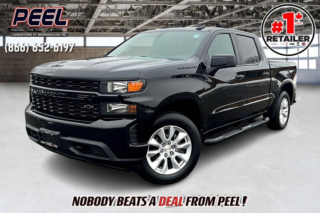 COME SEE WHY NOBODY BEATS A DEAL FROM PEEL! Your Source for ALL make and models used cars and trucks. Canadas #1 Stellantis Retailer for 9 years & counting!!

2021 Chevrolet Silverado 1500 Custom Crew Cab 4X4 | Black Exterior | 5.3L V8 Gasoline Engine | Dark Essentials Package | Front 40/20/40 Bench Seat | Remote Start | 7" Touchscreen Display | Apple CarPlay & Android Auto | Bluetooth | Auto Locking Rear Diff | Electronic Transfer Case | Trailering Package w/ Hitch Guidance | Class IV Hitch Receiver | Trailer Brake Controller | Chevytec Spray-in Bed Liner | Side Steps

Clean Carfax

Power, style, and capability come together in this 2021 Chevrolet Silverado 1500 Custom Crew Cab 4X4, finished in a sleek Black Exterior and enhanced by the Dark Essentials Package for a bold, aggressive look. Under the hood, the proven 5.3L V8 delivers strong performance and towing capability, complemented by an auto-locking rear differential and electronic transfer case for enhanced traction in any condition. The spacious cabin features a front 40/20/40 bench seat, a 7" touchscreen display with Apple CarPlay & Android Auto, Bluetooth connectivity, and the convenience of Remote Start to make every drive effortless. Built for work and play, the Trailering Package with Hitch Guidance, Class IV Hitch Receiver, and Trailer Brake Controller ensures youre ready to haul with confidence, while the Chevytec spray-in bed liner and durable side steps add functionality and long-term protection. With a Clean Carfax, this Silverado 1500 Custom delivers dependable power, modern tech, and rugged utility—perfect for getting the job done in style.
______________________________________________________

Engage & Explore with Peel Chrysler: Whether youre inquiring about our latest offers or seeking guidance, 1-866-652-6197 connects you directly. Dive deeper online or connect with our team to navigate your automotive journey seamlessly.

WE TAKE ALL TRADES & CREDIT. WE SHIP ANYWHERE IN CANADA! OUR TEAM IS READY TO SERVE YOU 7 DAYS!
______________________________________________________
Our advertised prices are for consumers (i.e end users) only. 

*FREE CarFax (click the link above to check it out at no cost to you!)*

*FULLY CERTIFIED! (Have you seen some of these other dealers stating in their advertisements that certification is an additional fee? NOT HERE! Our certification is already included in our low sale prices to save you more!)

______________________________________________________

Peel Chrysler — A Trusted Destination: Based in Port Credit, Ontario, we proudly serve customers from all corners of Ontario and Canada including Toronto, Oakville, North York, Richmond Hill, Ajax, Hamilton, Niagara Falls, Brampton, Thornhill, Scarborough, Vaughan, London, Windsor, Cambridge, Kitchener, Waterloo, Brantford, Sarnia, Pickering, Huntsville, Milton, Woodbridge, Maple, Aurora, Newmarket, Orangeville, Georgetown, Stouffville, Markham, North Bay, Sudbury, Barrie, Sault Ste. Marie, Parry Sound, Bracebridge, Gravenhurst, Oshawa, Ajax, Kingston, Innisfil and surrounding areas. On our website www.peelchrysler.com, you will find a vast selection of new vehicles including the new and used Ram 1500, 2500 and 3500. Chrysler Grand Caravan, Chrysler Pacifica, Jeep Cherokee, Wrangler and more. All vehicles are priced to sell. We deliver throughout Canada. website or call us 1-866-652-6197. 

Disclaimer Statement: At Peel Chrysler, your satisfaction is our priority. While many pre-owned vehicles originally come with two keys, variations may occur based on trade-ins, and all Peel Chrysler Pre-Owned Vehicles come standard with one key—any extras provided by the previous owner will be included with your purchase, and additional keys can be bought at the time of sale. Online prices and payments are for finance purchases. Used vehicles that are being financed are subject to a $499 (^$1500 non-prime) financing fee, while cash purchases (certified cheque, bank draft, or wire transfer) on used vehicles have a $2,000 surcharge ( online price + $2,000). Cash purchases of new vehicles only incur applicable taxes and licensing fees, and those priced above $100,000 (including accessories or add-ons) are subject to a federal luxury tax. Optional finance and lease terms are available, and if trading in a vehicle with an outstanding loan balance requiring Peel Chrysler to facilitate the lien payout, a Lien Payout Fee of $349 applies. Prices, rates, and payments are subject to change without notice. While we strive for accuracy, occasional technical or human errors may occur, so we encourage verifying all vehicle details, including features, options, materials, and specifications, with a Peel Chrysler representative by contacting us or visiting our dealership. Experience seamless convenience with our nationwide delivery options—visit our website or contact us for more details.