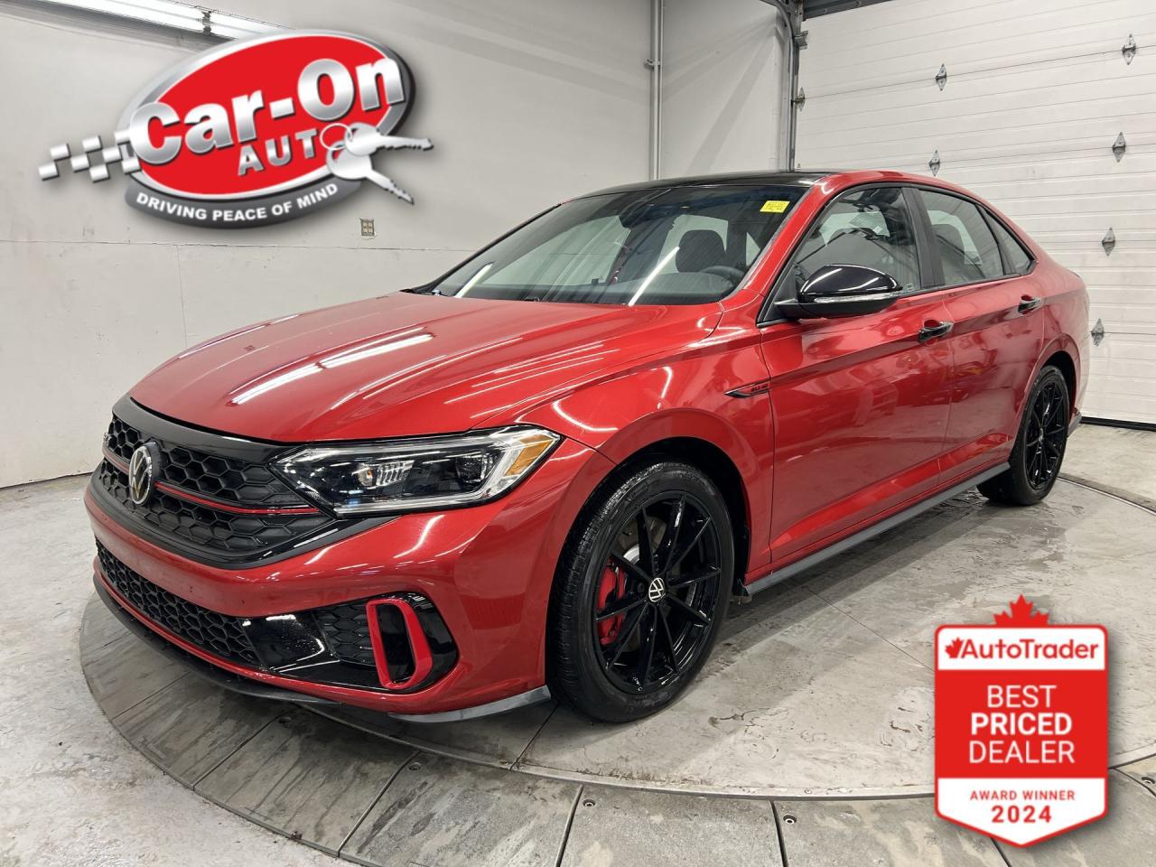 ONLY 400 KMS! 228HP AUTOMATIC 40TH ANNIVERSARY EDITION GLI IN STUNNING KINGS RED METALLIC!! Heated seats & steering, remote start, wireless Apple CarPlay/Android Auto, navigation, blind spot monitor, rear cross-traffic alert, lane-keep assist, pre-collision system, adaptive cruise control, backup camera, 18-inch black alloys, wireless charger, dual-zone climate control, paddle shifters, automatic headlights w/ auto highbeams, rain-sensing wipers, auto-dimming rearview mirror, keyless entry w/ push start, flat-bottomed sport steering wheel, Bluetooth and Sirius XM!!!