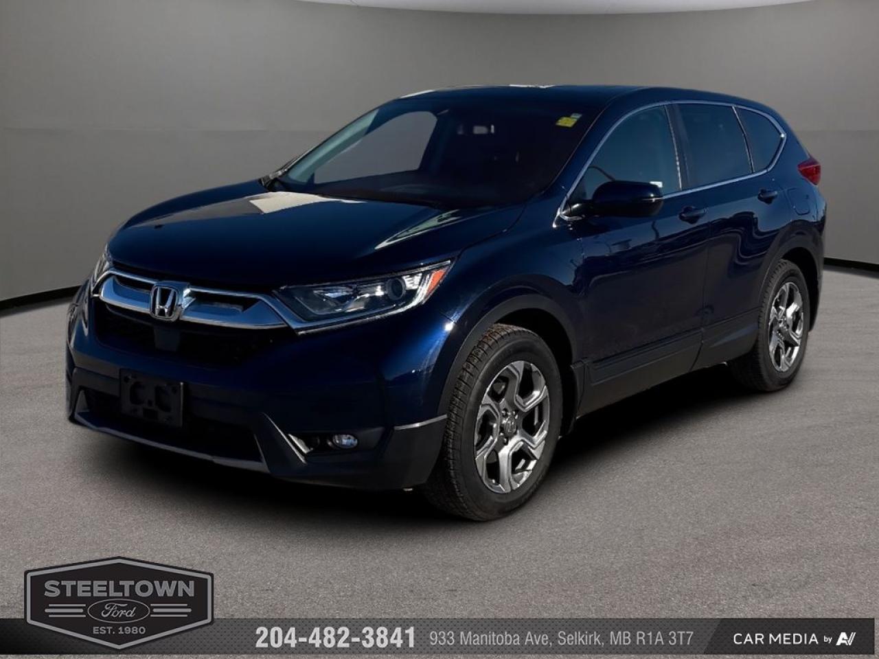<b>Sunroof,  Leather Seats,  Heated Steering Wheel,  Rear View Camera,  Heated Seats!</b><br> <br> We value your TIME, we wont waste it or your gas is on us!   We offer extended test drives and if you cant make it out to us we will come straight to you!<br><br><br> <br>   If youre shopping for a top shelf compact SUV, the CR-V remains one of your best bets, says Edmunds. This  2018 Honda CR-V is for sale today in Selkirk. <br> <br>A focus on practical design, this versatile 2018 Honda CR-V offers a family-friendly space with plenty of room and a thoughtful design. Ample storage and comfort features ensure this is a place to relax no matter the destination. A classy SUV, this model is economical while still offering plenty of fun. This  SUV has 120,896 kms. Its  nice in colour  . It has an automatic transmission and is powered by a  190HP 1.5L 4 Cylinder Engine.  <br> <br> Our CR-Vs trim level is EX-L AWD. The EX-L trim brings some luxury to this versatile crossover. It comes with leather seats which are heated in front, a heated, leather-wrapped steering wheel, a seven-inch audio display with Bluetooth, SiriusXM, and USB ports, a power liftgate, a power sunroof, aluminum wheels, dual-zone automatic climate control, a rearview camera, lane departure warning, collision mitigation braking system, and more. This vehicle has been upgraded with the following features: Sunroof,  Leather Seats,  Heated Steering Wheel,  Rear View Camera,  Heated Seats,  Bluetooth,  Power Tailgate. <br> <br>To apply right now for financing use this link : <a href=http://www.steeltownford.com/?https://CreditOnline.dealertrack.ca/Web/Default.aspx?Token=bf62ebad-31a4-49e3-93be-9b163c26b54c&La target=_blank>http://www.steeltownford.com/?https://CreditOnline.dealertrack.ca/Web/Default.aspx?Token=bf62ebad-31a4-49e3-93be-9b163c26b54c&La</a><br><br> <br/><br> Buy this vehicle now for the lowest bi-weekly payment of <b>$198.01</b> with $0 down for 84 months @ 8.99% APR O.A.C. ( Plus applicable taxes -  Platinum Shield Protection & Tire Warranty included   / Total cost of borrowing $9325   ).  See dealer for details. <br> <br>Family owned and operated in Selkirk for 35 Years.  <br>Steeltown Ford is located just 20 minutes North of the Perimeter Hwy, with an onsite banking center that offers free consultations. <br>Ask about our special dealer rates available through all major banks and credit unions.<br><br><br>Steeltown Ford Protect Plus includes:<br>- Life Time Tire Warranty <br>Cars cost less in Selkirk <br><br>Dealer Permit # 1039<br><br><br> Come by and check out our fleet of 110+ used cars and trucks and 140+ new cars and trucks for sale in Selkirk.  o~o