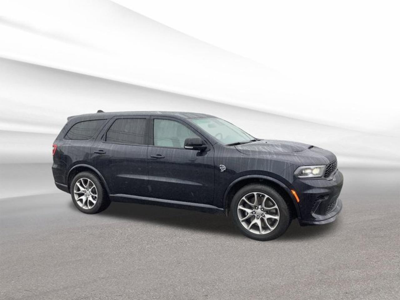 Experience exhilarating performance and modern luxury with the 2025 Dodge Durango SRT Hellcat Demo, now available at Steele Halifax Chrysler Dodge Jeep Ram FIAT. This demo SUV, finished in the bold Night Moves exterior and refined grey interior, offers a like-new experience with only 8 km on the odometer. Equipped with all-wheel drive and a powerful 6.2-litre Intercooled Supercharger Premium Unleaded V-8 engine, the Durango SRT Hellcat is engineered for those who demand both power and sophistication in Halifax.FEATURES OF THE Durango Srt Hellcat6.2-litre supercharged V-8 engineAll-wheel drive for enhanced tractionPremium Night Moves exterior colourDemo status with only 8 km drivenADVANCED SAFETY FEATURESForward Collision Warning system includedAdvanced airbag protection throughout cabinStability and traction control for safer handlingFour-wheel anti-lock braking systemPERFORMANCE AND EFFICIENCY6.2-litre V-8 delivers thrilling accelerationAutomatic transmission for effortless drivingAll-wheel drive enhances year-round capabilityPremium fuel optimizes engine performanceCOMFORT AND CONVENIENCESpacious four-door SUV designDual-zone climate control for passenger comfortPower-adjustable drivers seat for customizationKeyless entry for added convenienceTECHNONOLGY AND CONNECTIVITYModern infotainment system with touchscreen displayBluetooth connectivity for hands-free communicationUSB ports for device charging and mediaHigh-quality audio system for immersive soundCARGO SPACEFlexible rear cargo area for versatilitySplit-folding rear seats expand storage optionsAmple space for luggage or gearEasy-access liftgate for loading convenienceWHAT OTHER OWNERS LIKEExceptional V-8 engine power and accelerationConfident all-wheel drive in all conditionsSpacious and comfortable interior layoutAdvanced safety features for peace of mindThis 2025 Dodge Durango Srt Hellcats VIN is: 1C4SDJH95SC508813 .