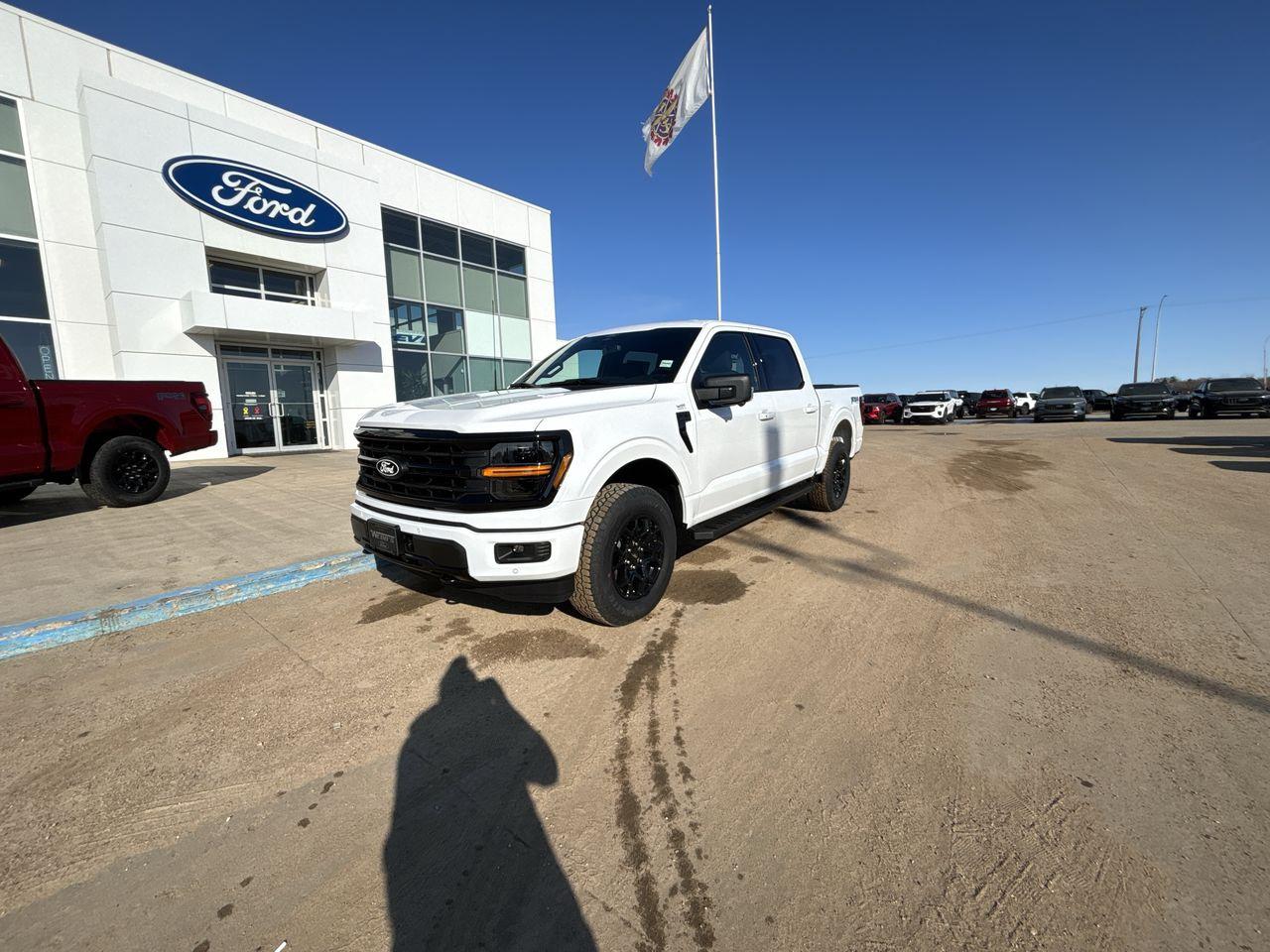 <p>Get ready to conquer any terrain with this brand new 2025 Ford F-150 4x4 Supercrew-145, available now at Webbs 1441. This powerful truck is decked out in Oxford White, showcasing its rugged good looks. Step inside and enjoy the comfort of Sport Cloth 40/Console/40 seating, while the XLT Black Appearance Package adds a touch of sporty sophistication.</p><p> </p><p>Under the hood, youll find a potent 3.5L V6 EcoBoost engine paired with a smooth-shifting 10-speed automatic transmission, ensuring you have the power and efficiency you need for any adventure. The FX4 Off-Road Package equips this F-150 with skid plates and a 3.55 Electronic Lock Rear Axle, making it ready to tackle even the most challenging trails.</p><p> </p><p>Here are five features that will make this F-150 stand out:</p><p><br /><br /></p><ul><ul><li><strong>FX4 Off-Road Package:</strong> Take on any terrain with confidence thanks to skid plates, a 3.55 Electronic Lock Rear Axle, and more.</li></ul></ul><p> </p><ul><ul><li><strong>XLT Black Appearance Package:</strong> Turn heads with a sleek and stylish blacked-out look.</li></ul></ul><p> </p><ul><ul><li><strong>3.5L V6 EcoBoost Engine:</strong> Experience powerful performance and impressive fuel efficiency.</li></ul></ul><p> </p><ul><ul><li><strong>10-Speed Automatic Transmission:</strong> Enjoy smooth and responsive shifting for a comfortable ride.</li></ul></ul><p> </p><ul><ul><li><strong>Power Sliding Rear Window:</strong> Enjoy fresh air and easy access to the bed.</li></ul></ul><p><br /><br /></p><p>Visit Webbs 1441 today to experience this incredible F-150 firsthand.</p><p> </p><p><em>Powered by AutoIntelligence™ AI</em></p><p> </p>