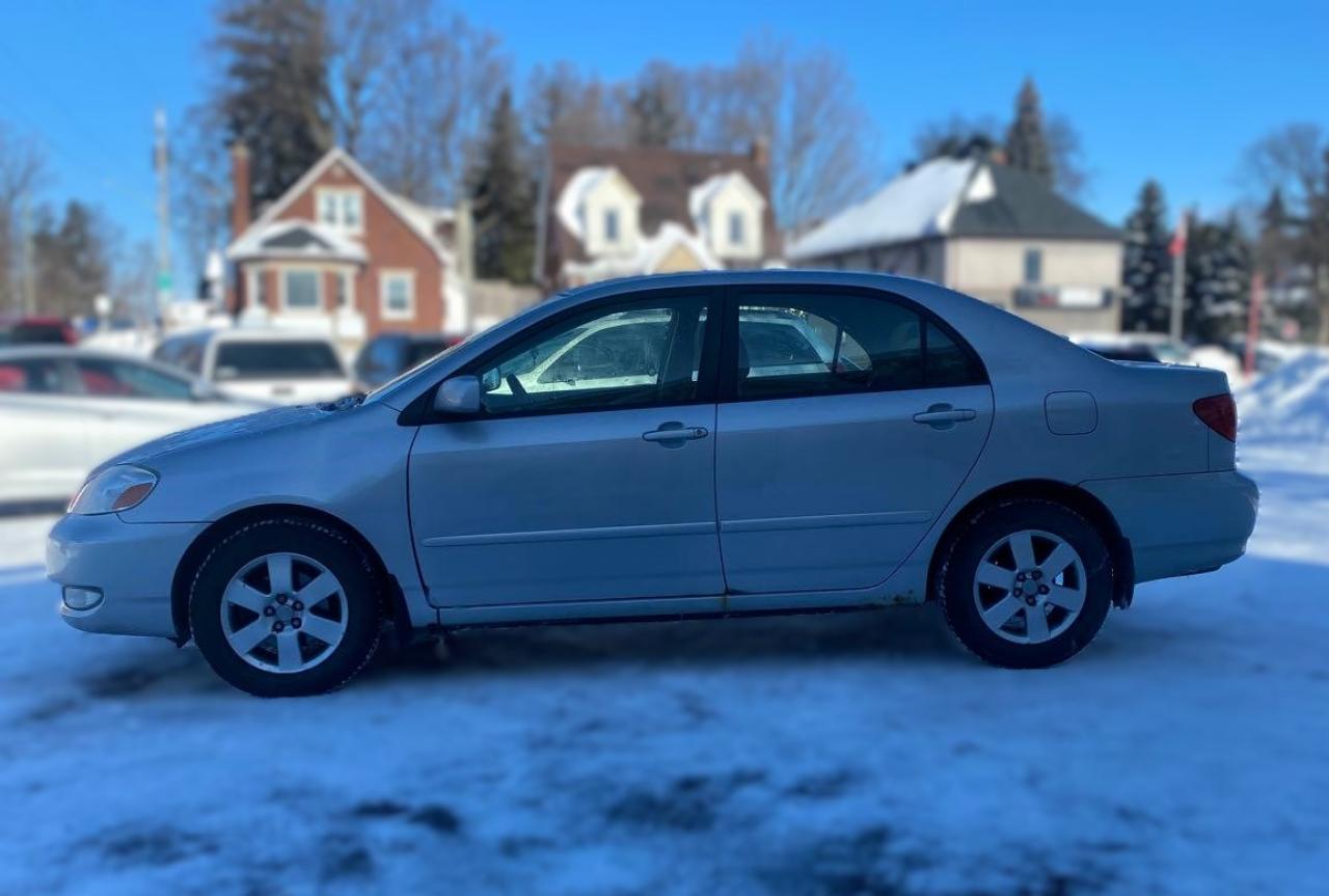 2006 Toyota Corolla 4dr Sdn LE Auto Photo3