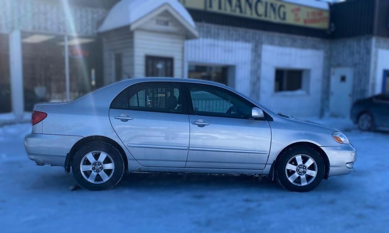 2006 Toyota Corolla 4dr Sdn LE Auto Photo5