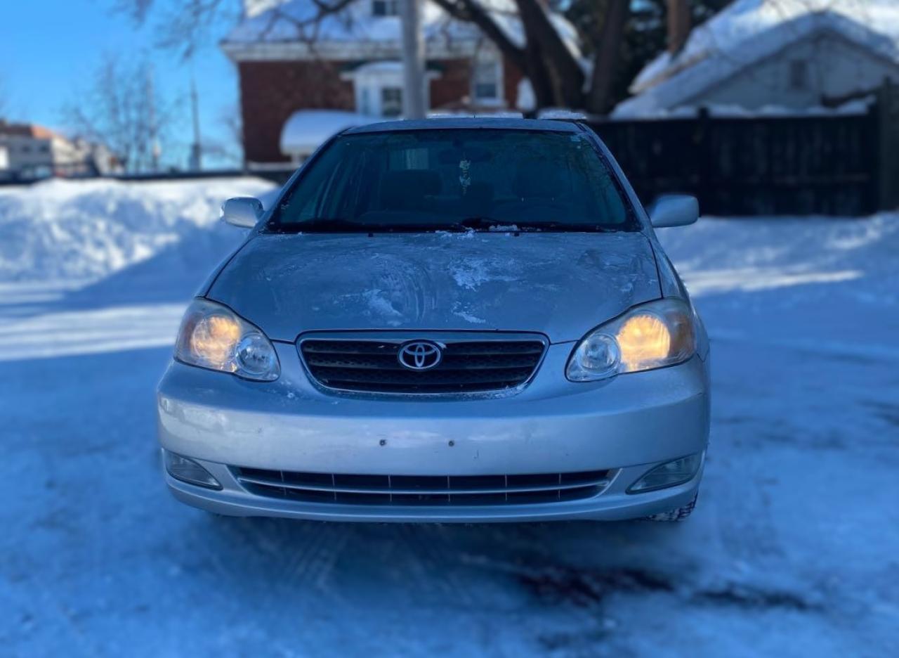 2006 Toyota Corolla 4dr Sdn LE Auto Photo2