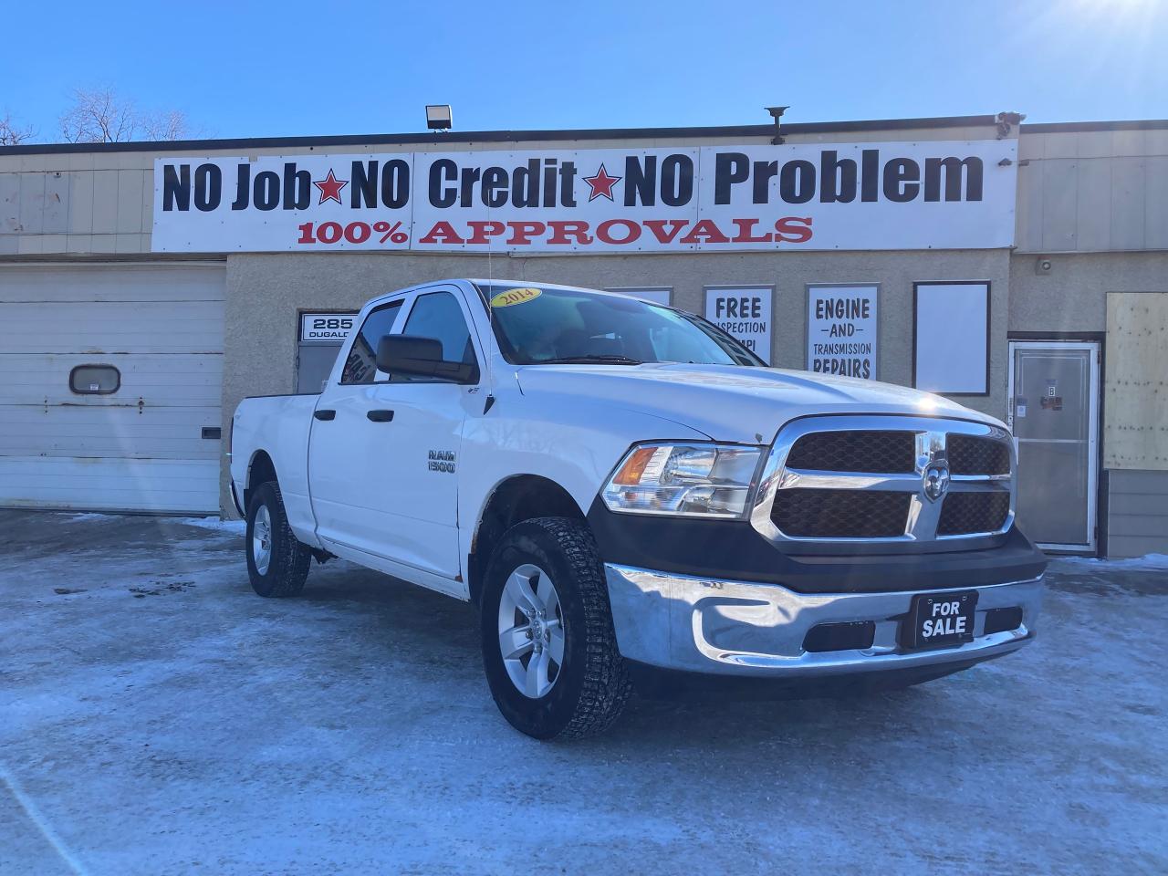 Used 2014 RAM 1500 4WD QUAD CAB 140.5