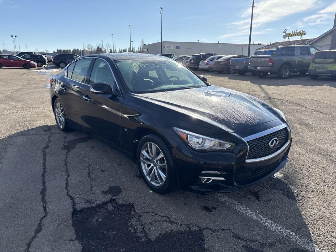 Ah, feast your very eyes  the embodiment of sleek sophistication awaits you! HEATED SEATS, BOSE SOUND SYSTEM, POWER MOONROOF, NAVIGATION!! Allow me to unravel the majesty of this 2014 INFINITI Q50, dressed to the nines in a classic Black hue. A 6-cylinder engine pulsates at the heart of this mobile marvel, paired to an Automatic Transmission for an effortless symphony of motion. 



The INFINITI also boasts an AWD system that grips the tarmac with the finesse of a ballroom dancer, instilling confidence in every turn and twist. Inside, youre embraced by a refined Interior, where luxury and connectivity intertwine gracefully, much like the notes of a jazz solo floating through the crisp winter air.



But my friends, this chariot doesnt just provide a ride  its a voyage into a realm where elegance meets utility. It has a history, having journeyed 208,357 kilometers - each kilometer spinning a yarn of adventures past, yet whispering the promise of countless escapades to come. 



For those with a taste for unparalleled poise and prowess, this INFINITI Q50 stands as a testament to automotive excellence. Dont merely take my word for it, visit and witness this fusion of engineering and luxury firsthand. Stock # 140260 awaits! 





 Call 587-409-5859 for more info or to schedule an appointment! Fully Inspected, ALL Work Complete and Included in Price! Listed Pricing is valid for 72 hours. Price listed is a finance price only and includes a finance rebate. This vehicles Cash Price is listed and available on our dealer website at parkmazda dot ca. Financing is available, please see dealer for term availability and interest rates. AMVIC Licensed Business.