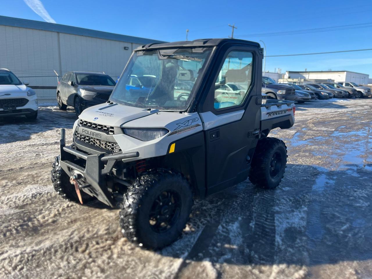<p data-start=0 data-end=312>The 2022 Polaris Ranger 1000 Trail Boss is a rugged, high-performance side-by-side built for those who demand power, durability, and capability on any terrain. Equipped with a 999cc ProStar engine delivering 61 horsepower, the Ranger 1000 Trail Boss is designed for both heavy-duty work and off-road adventure.</p><p data-start=0 data-end=312>&nbsp;</p><p data-start=314 data-end=646>This machine stands out with its factory-installed, industry-exclusive self-leveling suspension, ensuring a smooth ride even when carrying heavy loads. With an impressive 12 inches of ground clearance, arched A-arms, and 26-inch Pro Armor tires, the Trail Boss is ready to tackle rough trails, deep mud, and rocky paths with ease.</p><p data-start=314 data-end=646>&nbsp;</p><p data-start=648 data-end=979>The Ranger 1000 Trail Boss is built for work with a best-in-class 2,500-pound towing capacity and a gas-assist dump box that can handle up to 1,000 pounds of cargo. The Pro-PVTi transmission delivers smooth acceleration and consistent power, while the True On-Demand AWD system automatically engages when you need extra traction.</p><p data-start=648 data-end=979>&nbsp;</p><p data-start=981 data-end=1273>Inside, youll find a comfortable and practical cabin with premium seating, ample storage, and an intuitive control layout. With features like full-body skid plates, a front bumper, and full-coverage fender flares, the Trail Boss is built to withstand the toughest jobs and roughest trails.</p><p data-start=981 data-end=1273>&nbsp;</p><p data-start=1275 data-end=1488 data-is-last-node= data-is-only-node=>Ready to take your work and play to the next level? Contact us today to learn more about the 2022 Polaris Ranger 1000 Trail Boss, explore flexible financing options, and take advantage of fast nationwide delivery!</p>