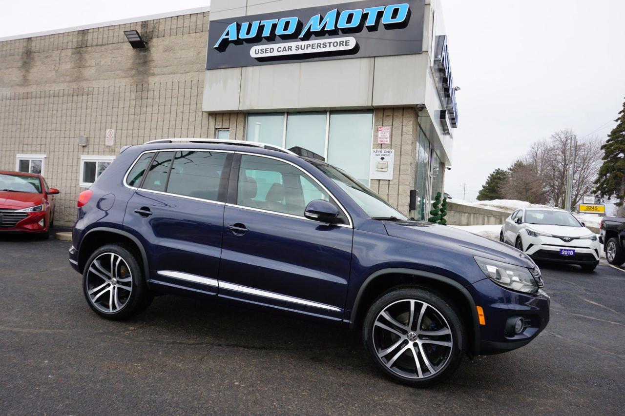 <div>*SAFETY INCLUDED*FREE ACCIDENT*LOCAL ONTARIO CAR<span>* </span><span>Nice Clean Volkswagen Tiguan Highline-R Line 4Motion/AWD 2.0L 4 Cylinders With Automatic Transmission. Blue on Brown Leather Interior. Fully Loaded with: Power Door Locks, Power Windows, and Power Heated Mirror, CD/AUX, AC, Alloys, Back Up Camera, Navigation System, Panoramic Roof, Leather Heated Seats, Bluetooth, Heated Seats, Fog Light, Push To Start, Alloys, Steering Mounted Controls, Side Turning Signal, Memory Power Driver Seat, Heated Steering Wheel, Premium Audio System, Power Tail Gate, Roof Rack, AND ALL THE POWER OPTIONS </span></div><br /><div><span>-------------------------------------------------</span><br><span>Financing options are available start from 6.99% with $0 Down payment O.A.C.</span><br><span>-------------------------------------------------</span><br><span>SAFETY CERTIFICATION INCLUDED*** Vehicle comes with: Safety Certification, and Car Fax Report ALL INCLUDED!! At no extra cost to you!! Dont miss this opportunity to own a high-quality, pre-owned vehicle. </span><br><span>-------------------------------------------------</span><br><br><span>Additionally, our vehicles qualify for up to 4 years of extended warranty. Please speak to your sales representative for more information.</span><br><span>-------------------------------------------------</span><br><span>We are open Monday to Saturday from 10am - 6pm, Sundays Closed.</span><br><span>-------------------------------------------------</span><br><br><span>We also welcome trade-ins, with on-site buyers available to estimate your vehicle on the same day.</span><br><span>-------------------------------------------------</span><br><br><span>Visit us at 3219 Harvester Road, Burlington, L7N 3N8 or call us at Nine O Five-281-2255 for more information.</span><br><span>------------------------------------------------</span><br><span>Check our inventory at www automotoinc ca</span></div>