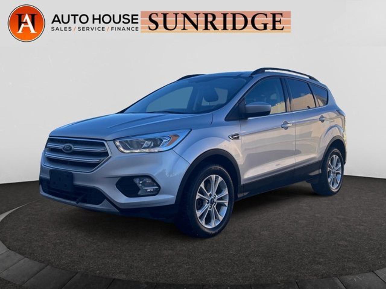2018 FORD ESCAPE SEL WITH 121185 KMS, BACKUP CAMERA, LEATHER SEATS, AUTO START/STOP, HEATED FRONT SEATS, HEATED MIRROR, BLUETOOTH USB/AUX AND MORE!.ALL CREDIT ACCEPTED!One month at a job? Bankruptcy? New to Canada? Collections? Student or work visas? Previous repossessions? Good or bad credit? Weve got you covered! Get pre-approved today at www.autoshouse.com!What We Offer:*Low Bi-Weekly Payments*Instant Approvals*Credit Consolidation*Employment Insurance*Negative Equity CoverageOperating Hours:Mon-Thurs: 10 am -- 8 pmFri-Sat: 10 am -- 6 pmCall Sunridge 403-291-0891 ! All vehicles come with a full mechanical fitness assessment and CARFAX report.Referral Program:Refer friends and family and earn $500 for each referral!AMVIC Licensed DealerAfter a credit check, we can determine payments, APR, terms, and interest rates based on your credit (O.A.C). Individual credit will affect bi-weekly payments and the total cost of credit. Similar to Chevrolet, GMC, Honda, Toyota, Cadillac, Nissan, Ford, Volvo 2007, 2008, 2009, 2010, 2011, 2012, 2013, 2014, 2015, 2016, 2017, 2018Location: 3312 26th ST. N.E. Calgary ABCARFAX IS AVAILABLE TO THE CONSUMER.All photos are of the vehicle featured in the advertisement.