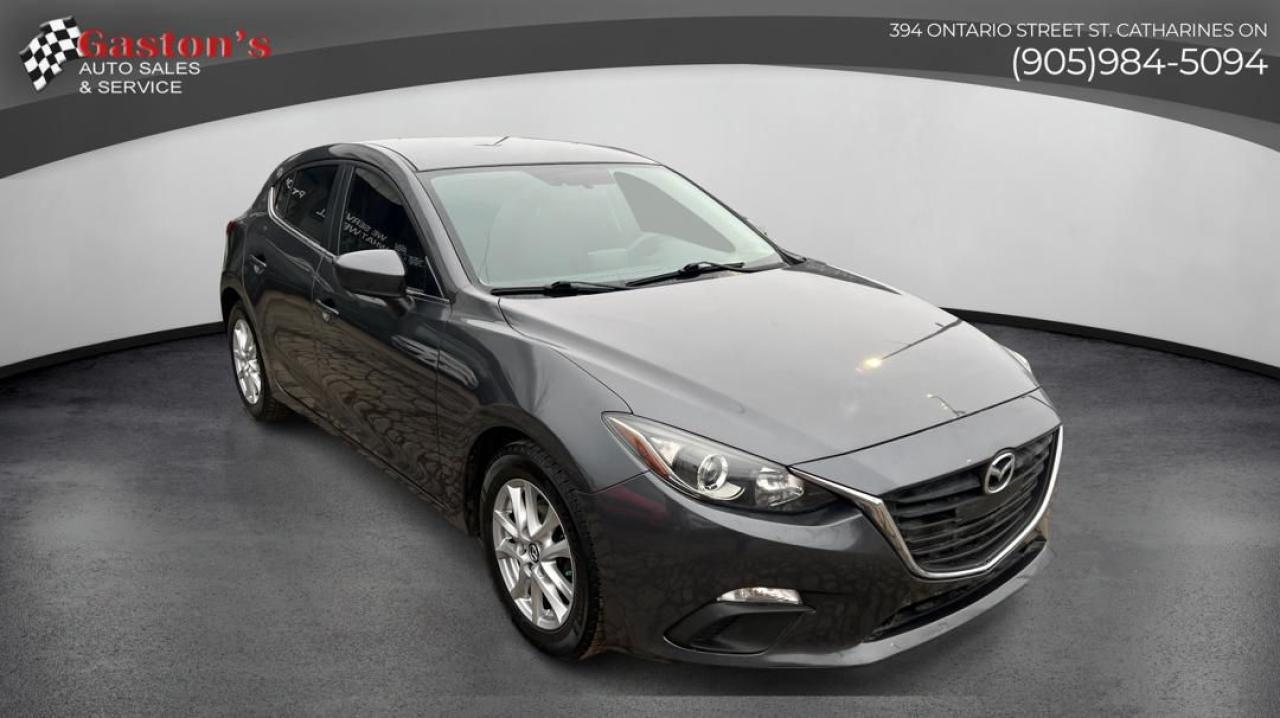 <p class=mb-3 last:mb-0>Elevate your driving experience with the 2014 Mazda 3 - a sleek, responsive vehicle that puts the power in your hands. Packed with high-tech features like a Tire Pressure Monitoring System, backup camera, and active blind spot assist, this car is the perfect blend of style and substance.</p><ul><li>Tire Pressure Monitoring System to keep you safe on the road</li><li>Backup camera for easy parking and reversing</li><li>Active blind spot assist to enhance your awareness</li><li>5-passenger seating with bucket seats for comfort</li><li>Power locks, mirrors, and windows for ultimate convenience</li></ul><p class=mb-3 last:mb-0>The 2014 Mazda 3 is more than just a car - its a driving companion that elevates your daily commute. With its responsive handling and suite of advanced safety technologies, youll enjoy a thrilling, confident ride every time you get behind the wheel. Whether youre running errands or embarking on a road trip, this Mazda will transform your driving experience.</p><p class=mb-3 last:mb-0>This compact car is perfect for the modern, on-the-go individual who demands both performance and practicality. With its sleek, aerodynamic design and versatile cargo space, the 2014 Mazda 3 seamlessly integrates into your active lifestyle, making every journey more enjoyable.</p><p>*** PRICE PLUS HST AND LICENSING NO HIDDEN FEES! INCLUDES CERTIFICATION! *** View our full inventory at gastonsautosales.com ***CARFAX VERIFIED!*** *** FAMILY OWNED AND OPERATED SINCE 1980! PLEASE CALL FOR FINANCING OUR FINANCE DEPARTMENT WILL WORK HARD TO GET YOU THE BEST RATE AND BEST TERM (OAC) *** WE SERVICE WHAT WE SELL! IF WE DO NOT HAVE THE VEHICLE OF YOUR CHOICE ON OUR LOT, ASK DANNY AND HE WILL FIND IT FOR YOU ABSOLUTELY NO OBLIGATIONS! ***</p><p>***Thumbnail author:<br /><a href=”http:/www.freepik.com”>Designed by starline / Freepik</a></p>